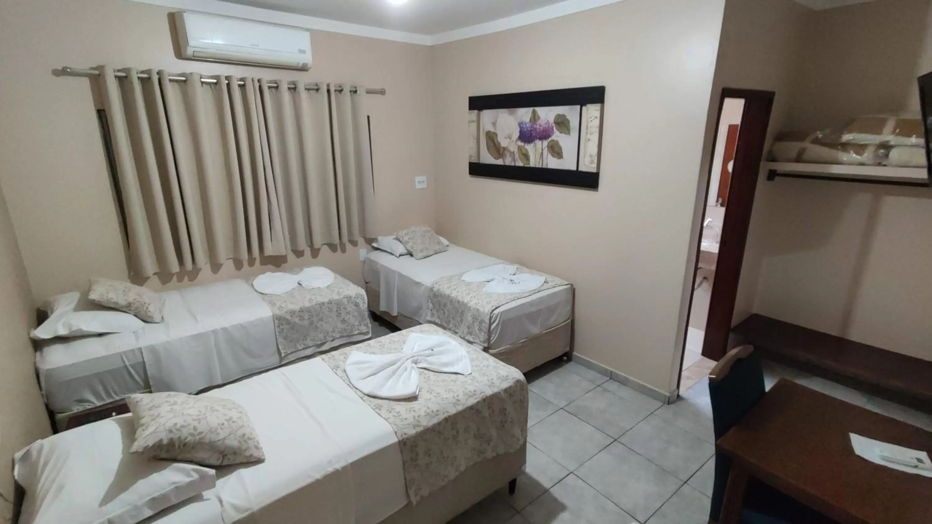 Bed in Hotel Barretos