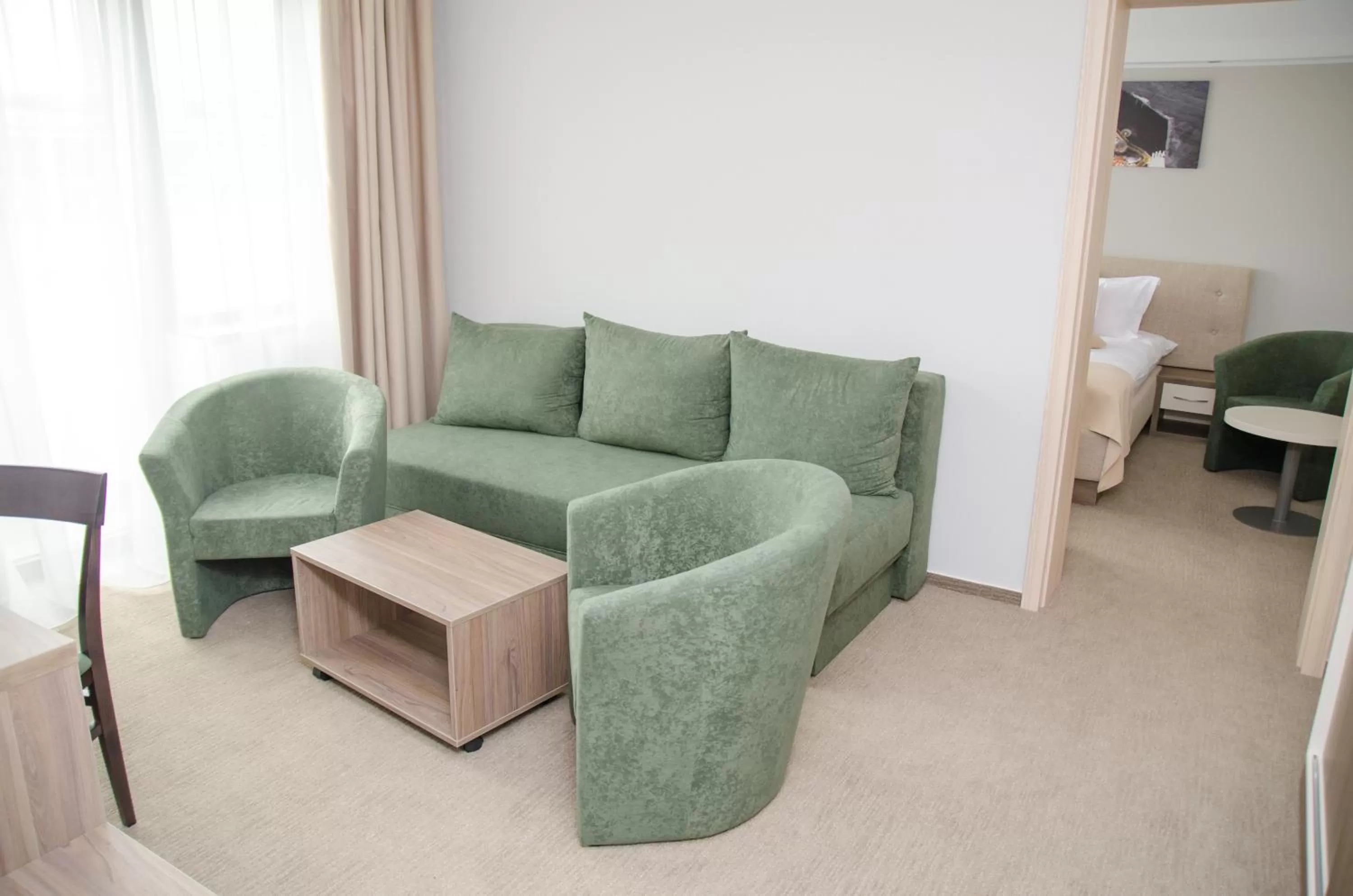 Bed, Seating Area in Potaissa Hotel