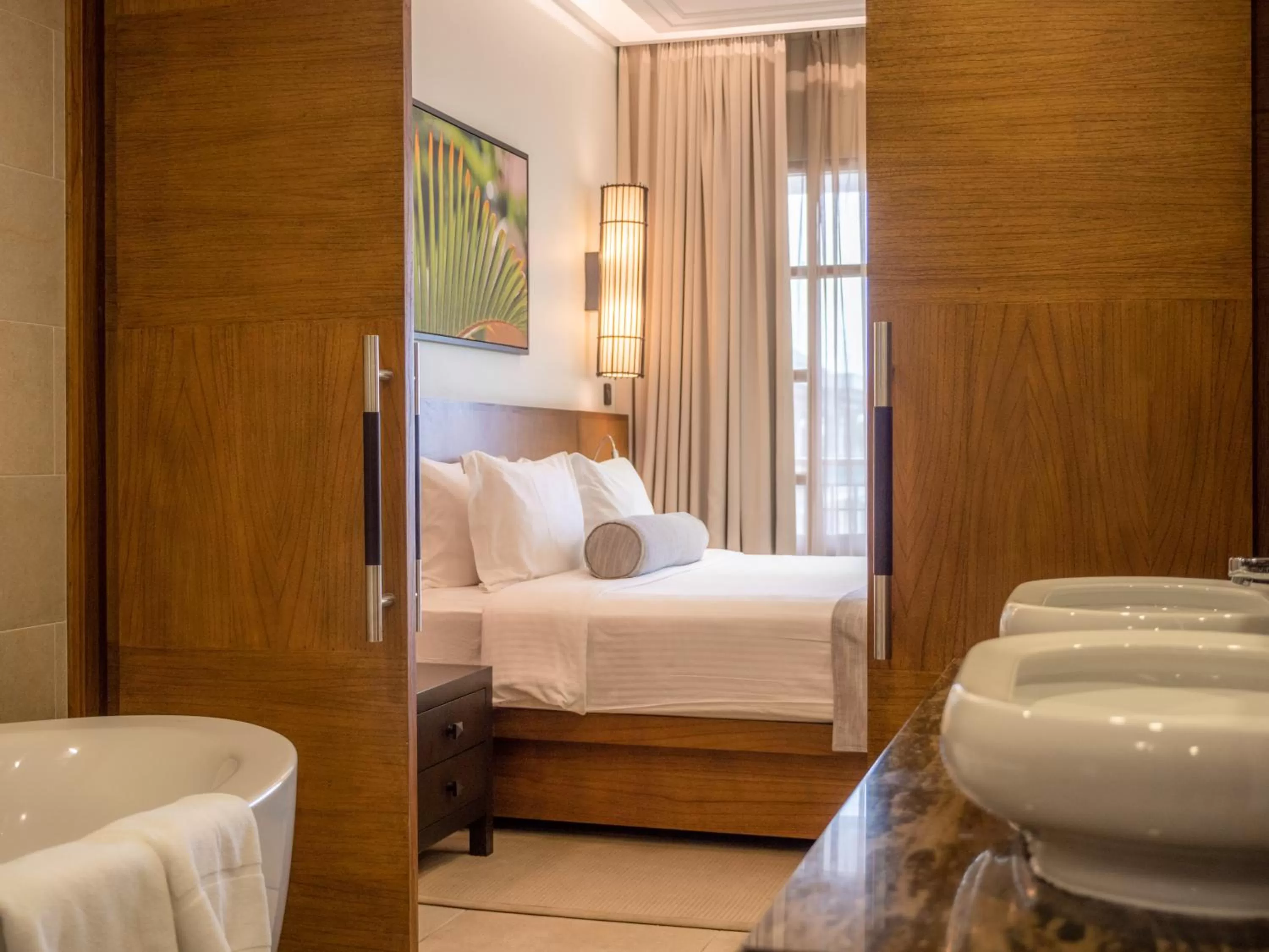 Bed in Savoy Seychelles Resort & Spa