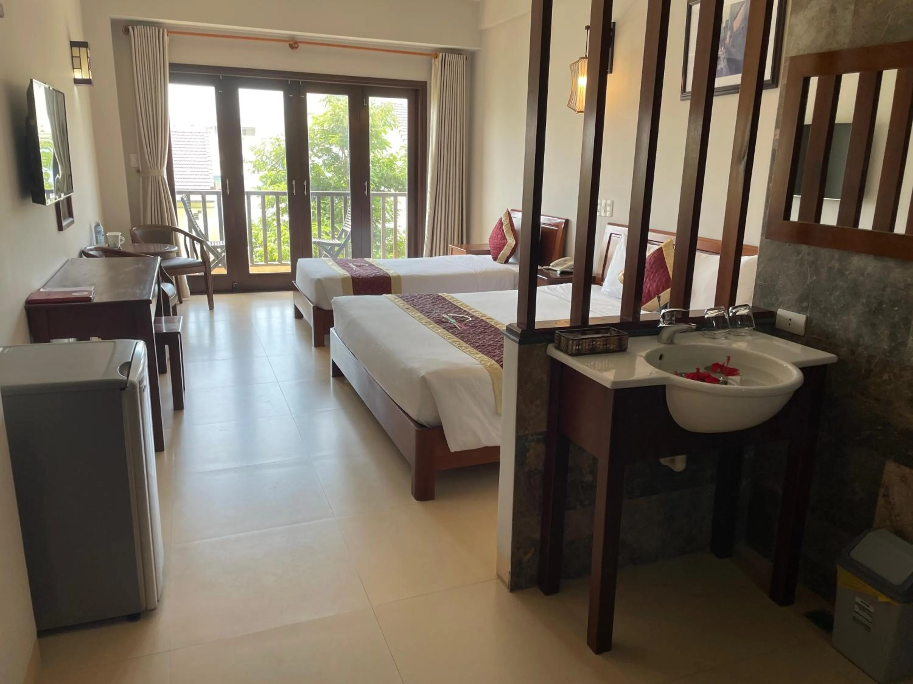 Bed in Sunshine Hoian Hotel