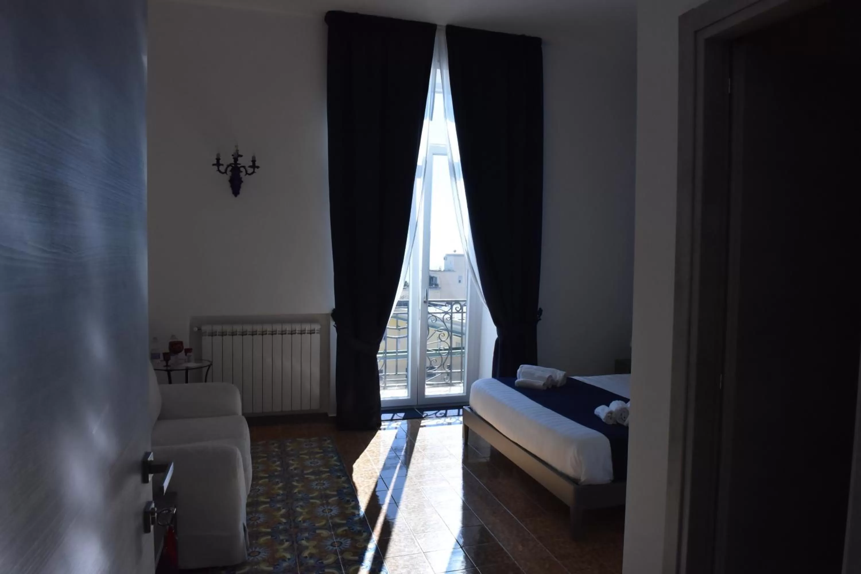 Photo of the whole room, Bed in Specchio di Parthenope B&B