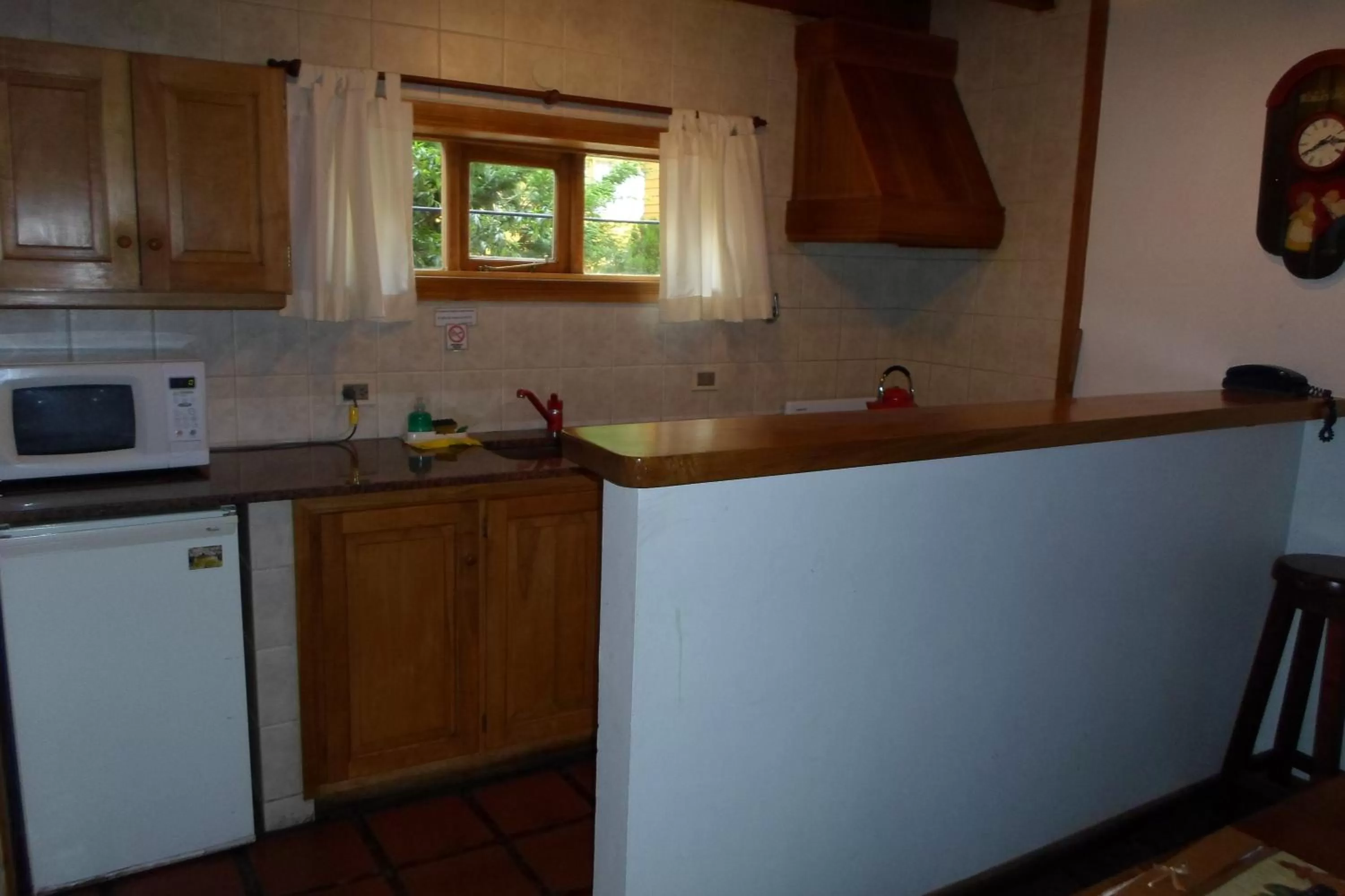 Kitchen or kitchenette in Apart Hotel Robles del Sur