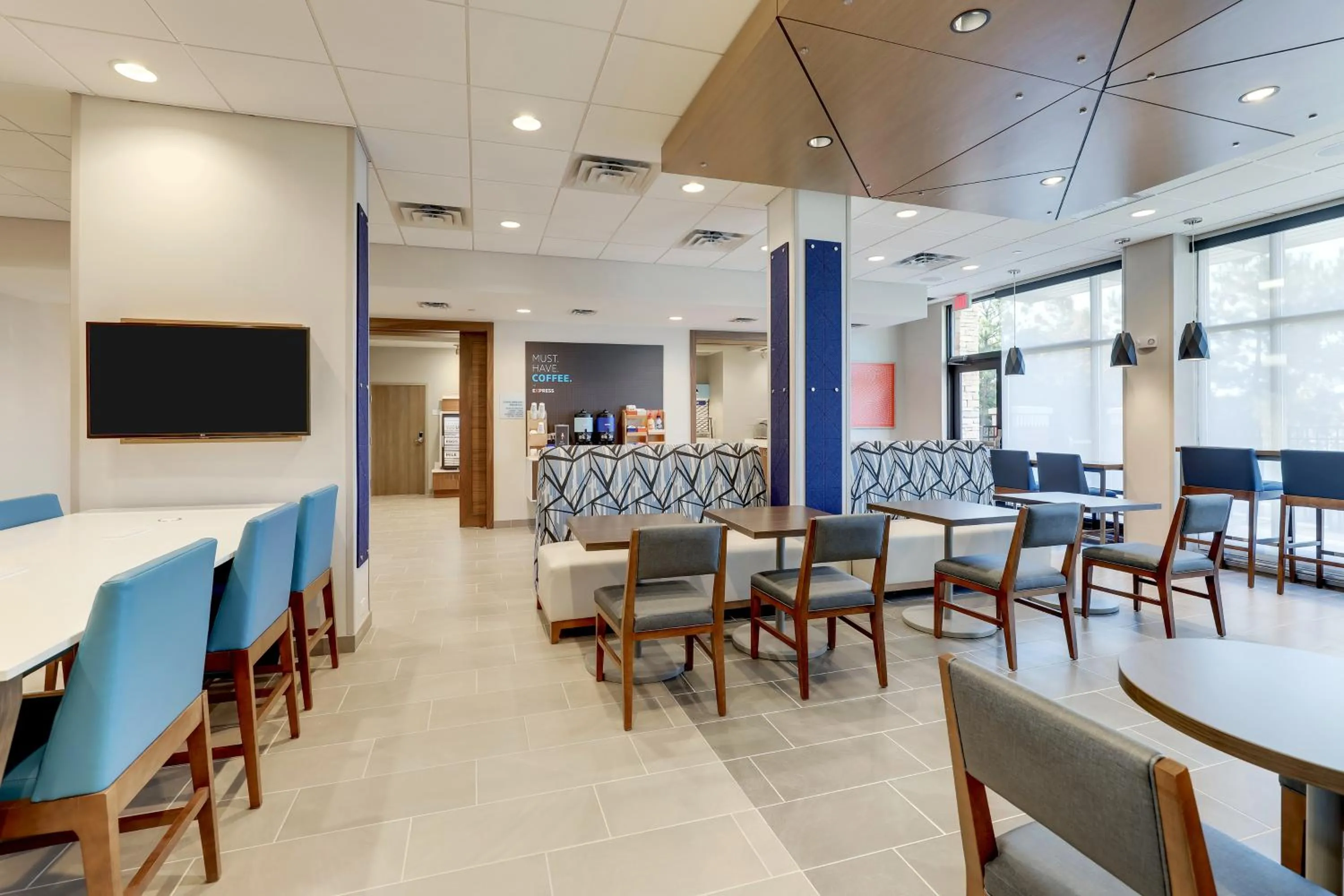 Seating area in Holiday Inn Express Holly Springs - Raleigh Area by IHG