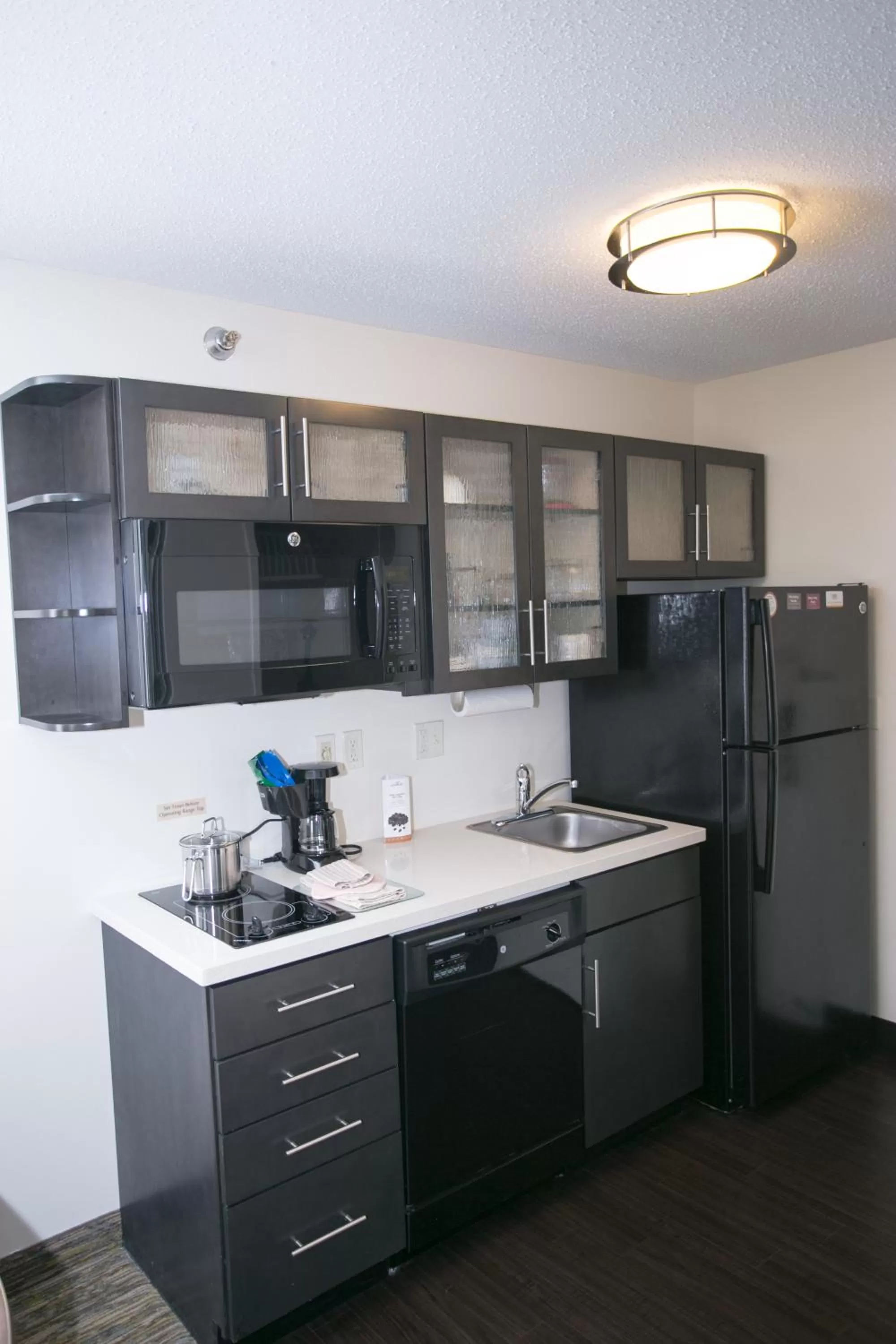 Kitchen or kitchenette in Candlewood Suites Fargo-North Dakota State University by IHG