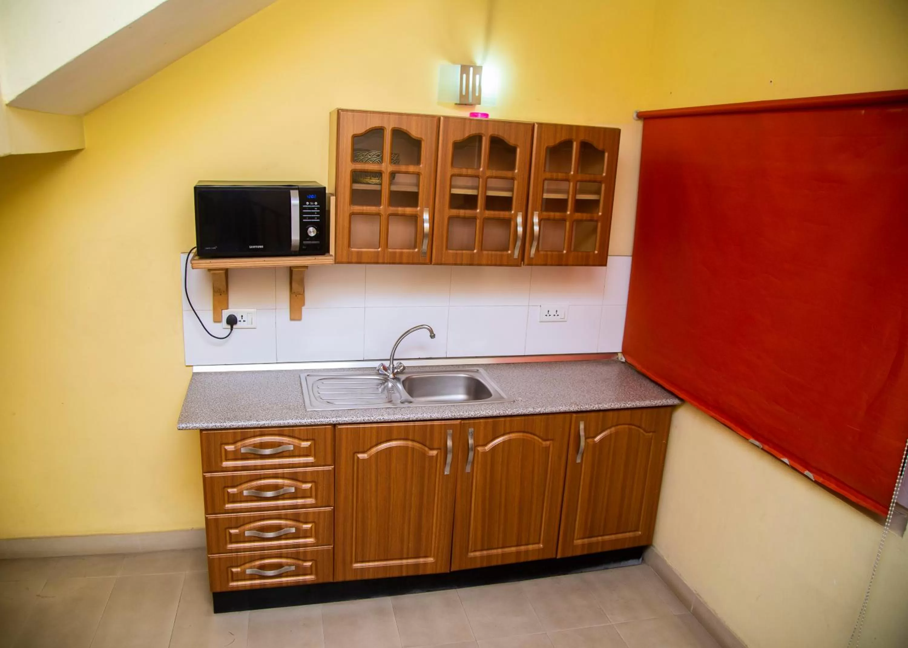 Kitchen or kitchenette in Airside Hotel