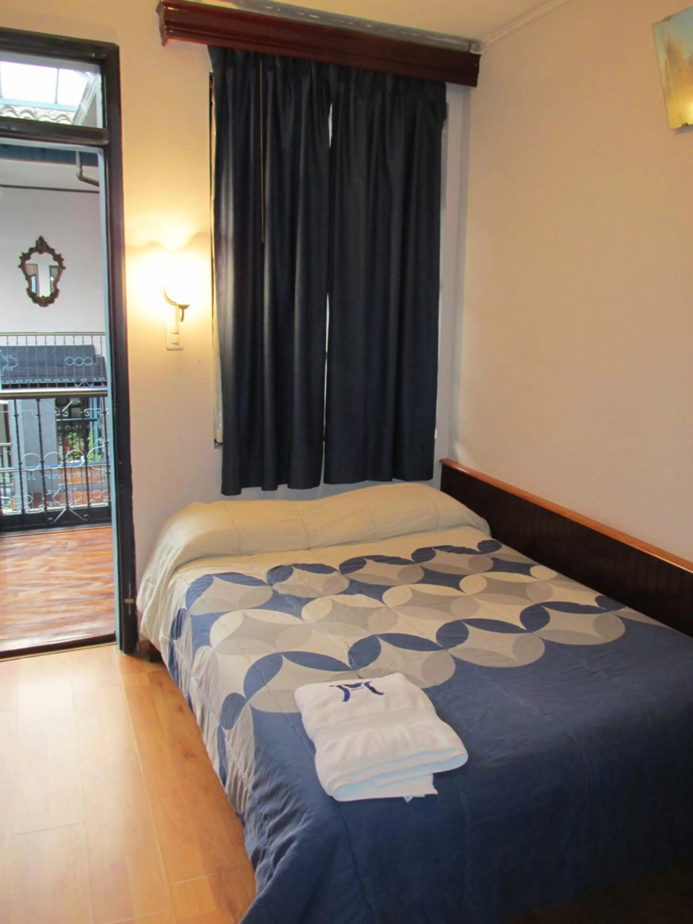 Photo of the whole room, Bed in Hotel Montecarlo