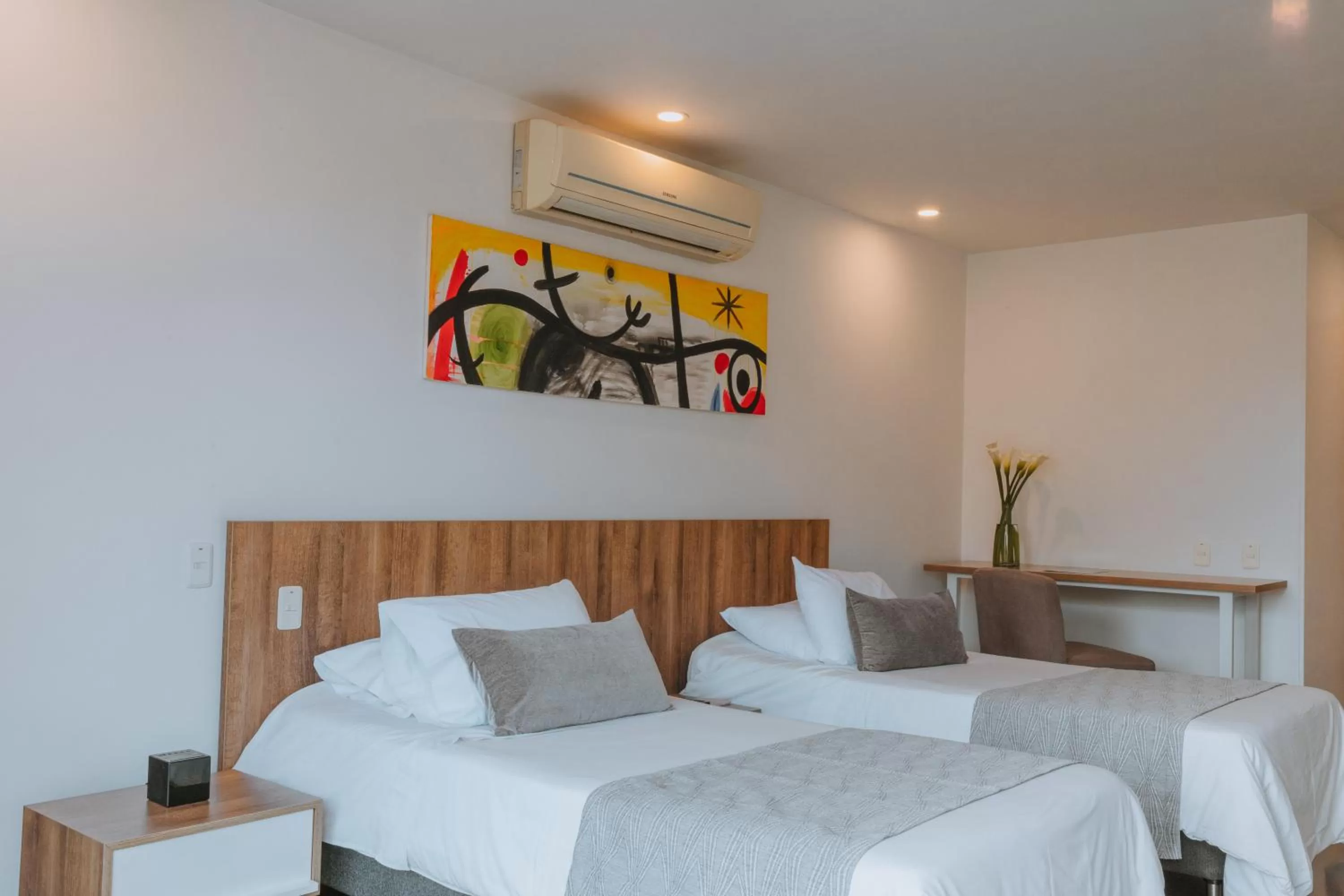 Bedroom, Bed in Travelers Orange Suites