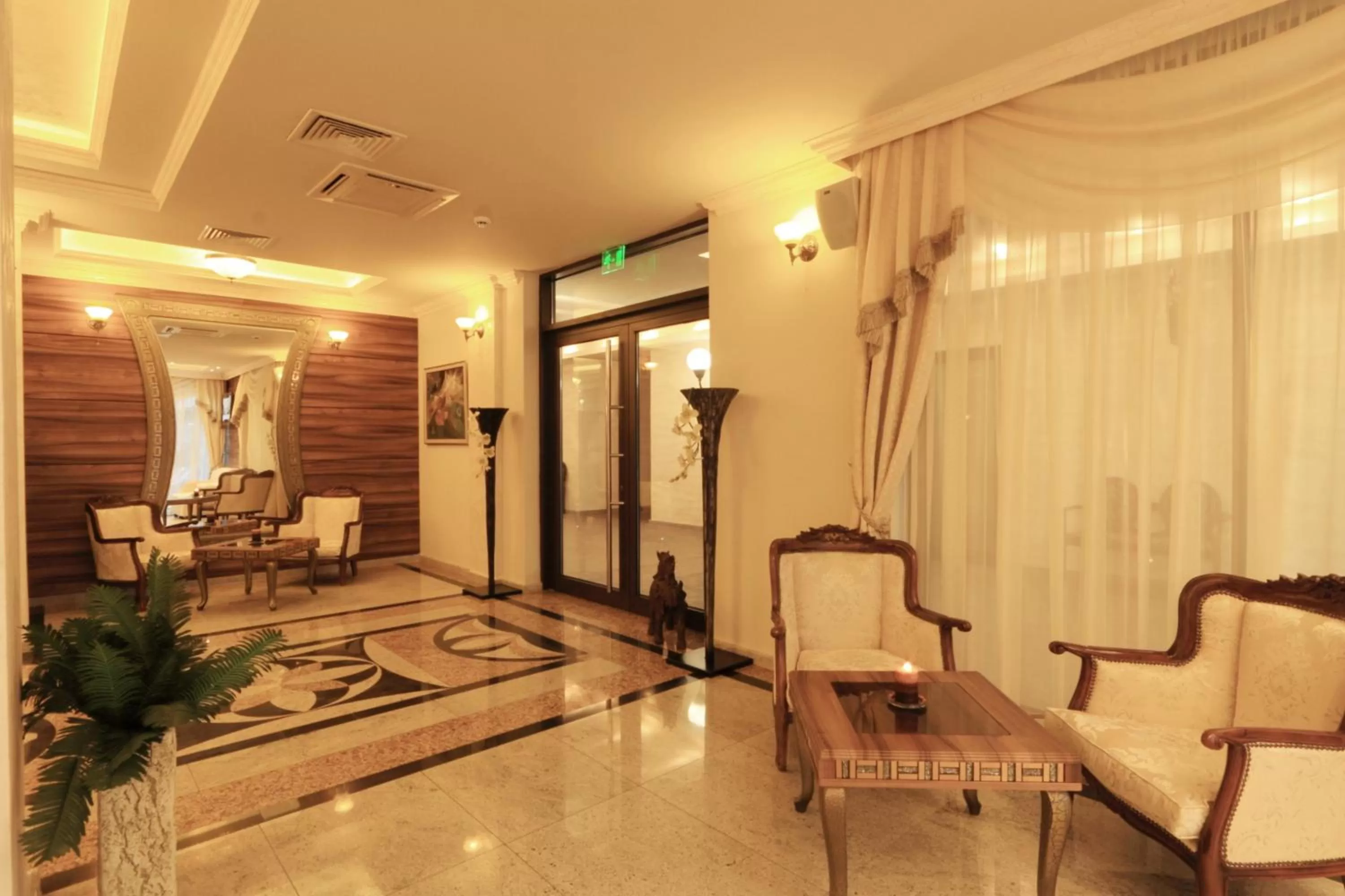 Lobby or reception in Penelopa Palace Apart Hotel & SPA