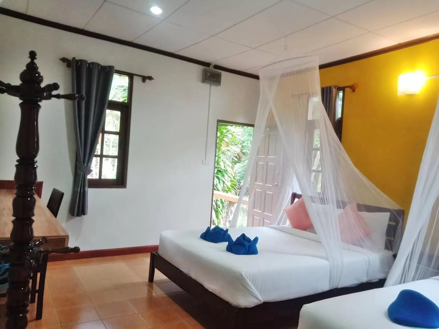 Bed in Tree Tops River Huts