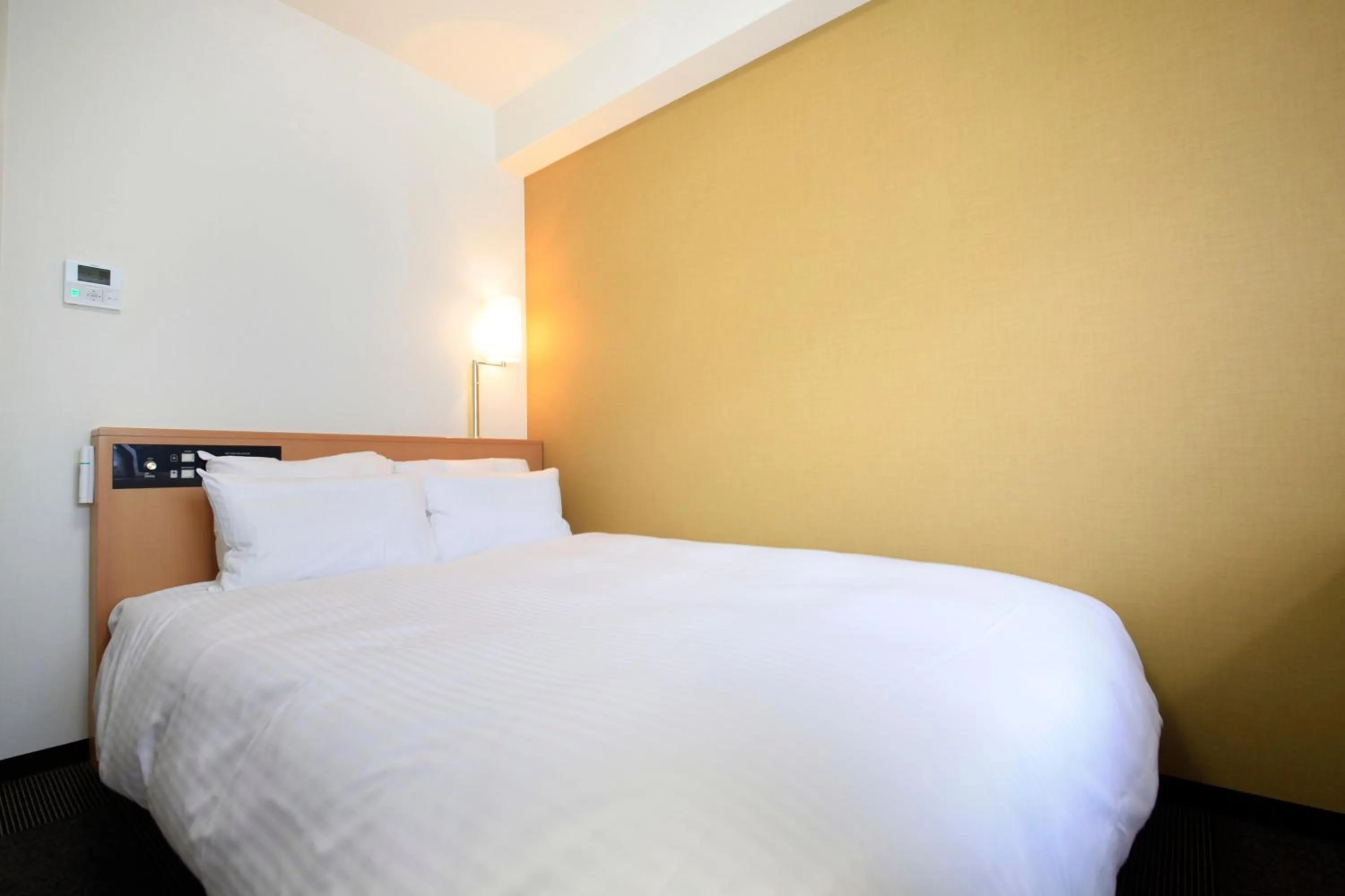 Bed in Richmond Hotel Hakata Ekimae