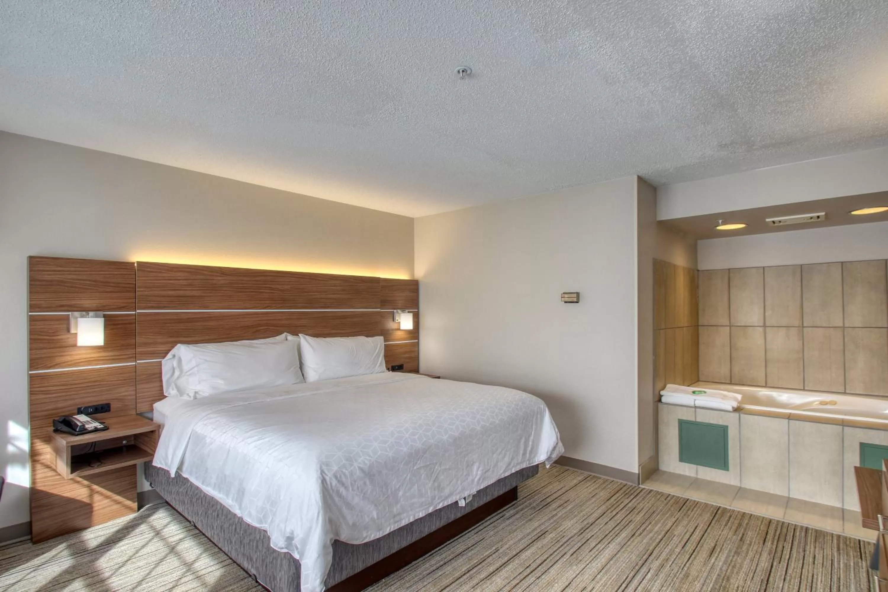 Photo of the whole room, Bed in Holiday Inn Express Hotel & Suites Oshkosh - State Route 41 by IHG