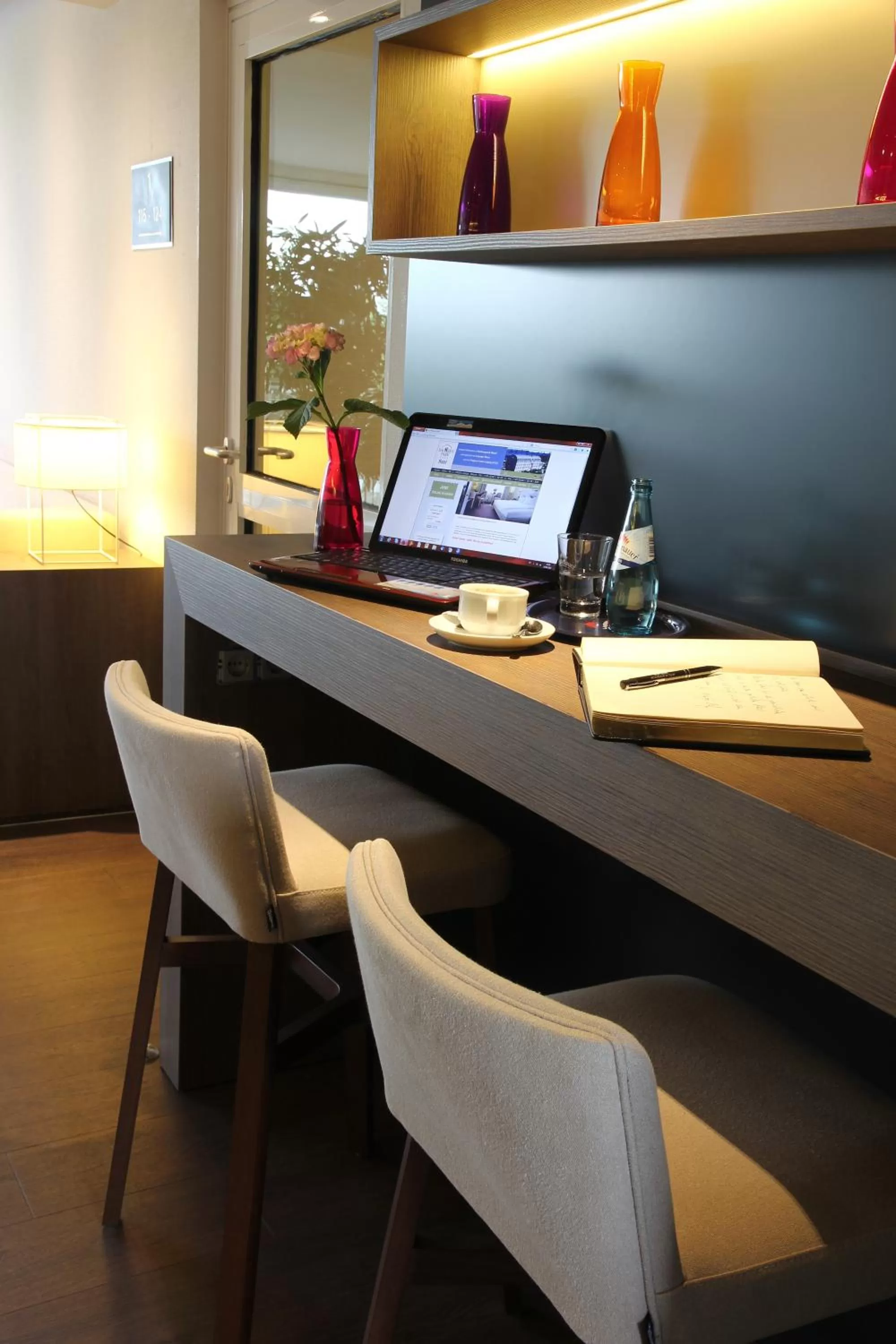 Communal lounge/ TV room in Sachsenpark-Hotel