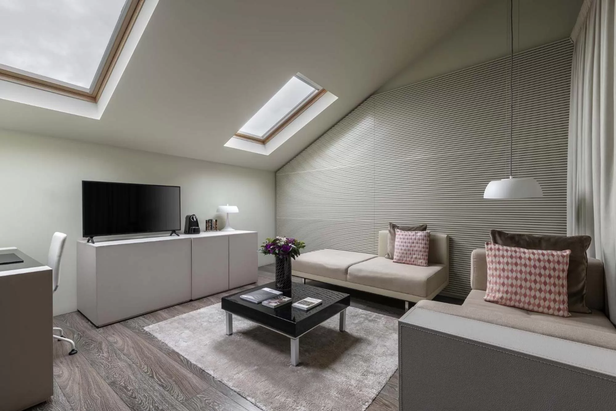 Communal lounge/ TV room in 9Hotel Mercy