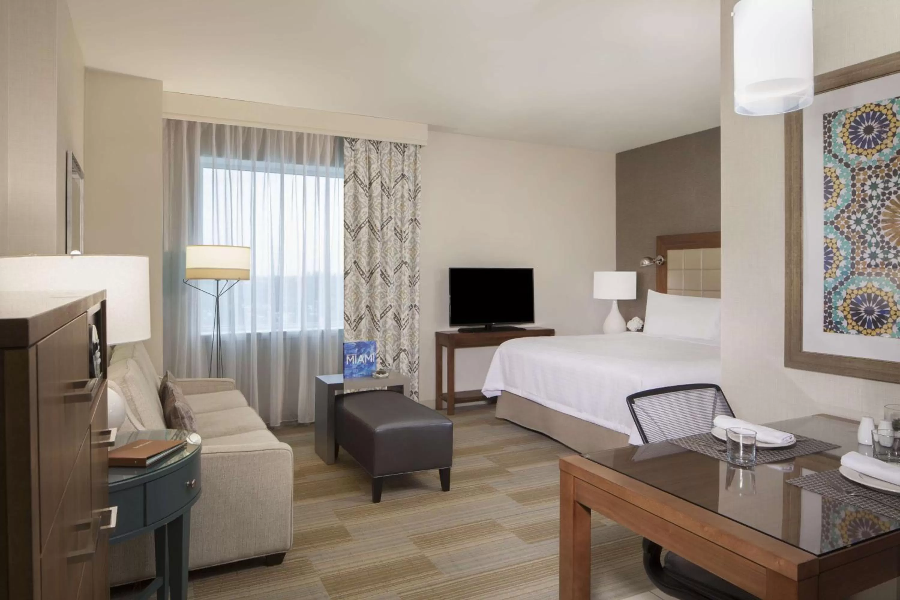 Living room, Bed in Homewood Suites by Hilton Miami Dolphin Mall