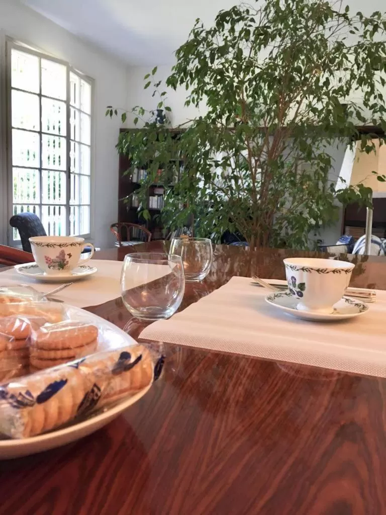 Communal lounge/ TV room in b&b le magnolie