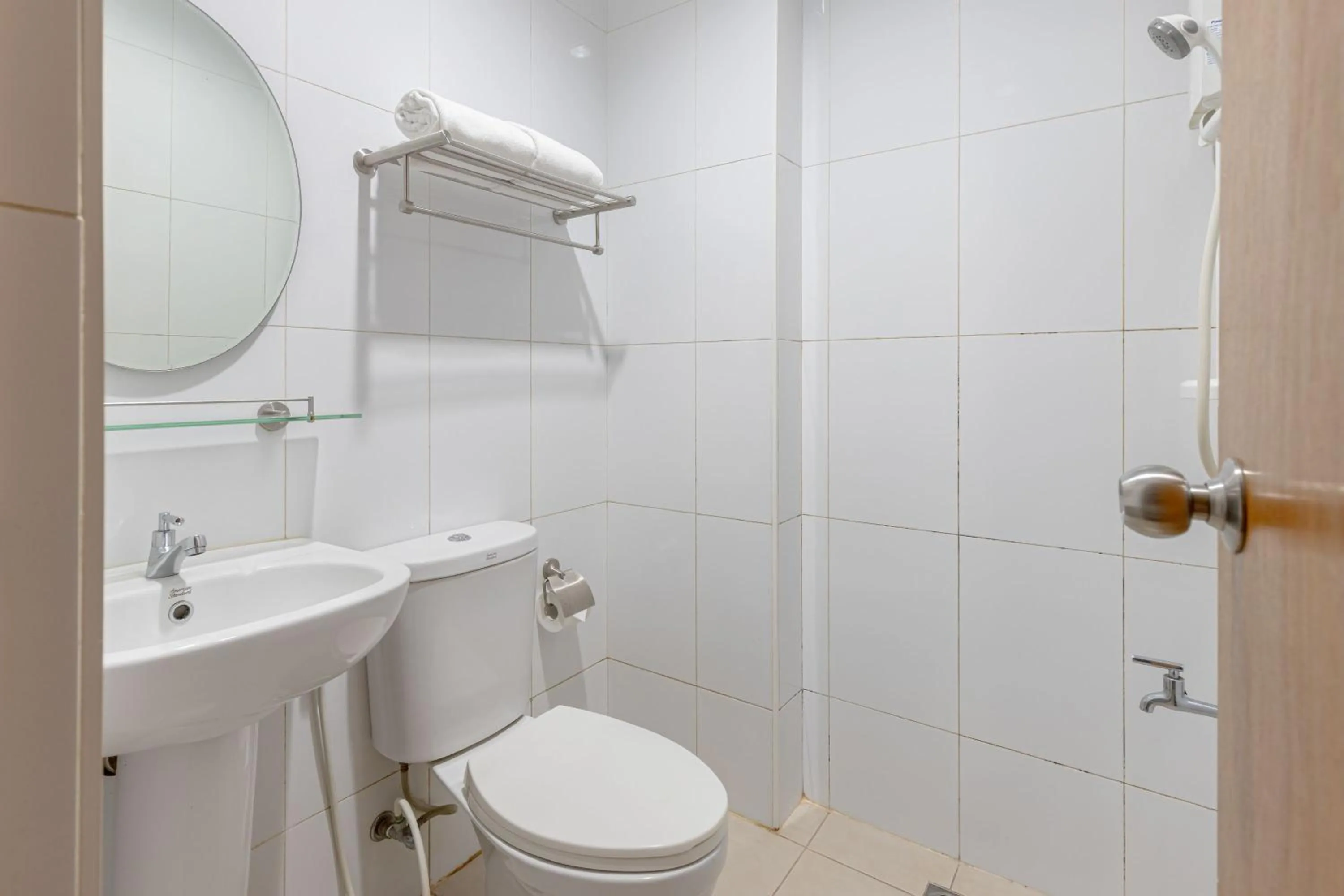 Bathroom in Baymont Suites & Residences