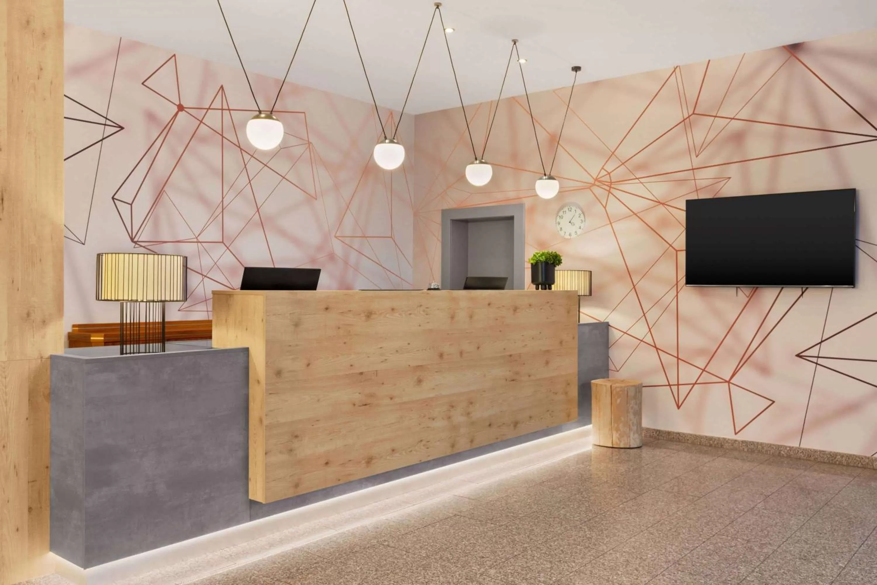 Lobby or reception in Ramada by Wyndham München Airport