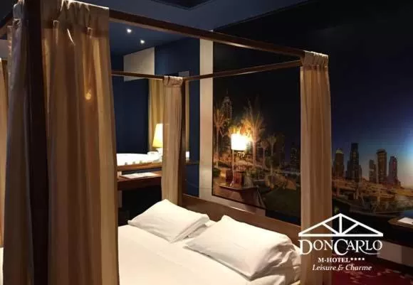 Bed in Hotel Don Carlo