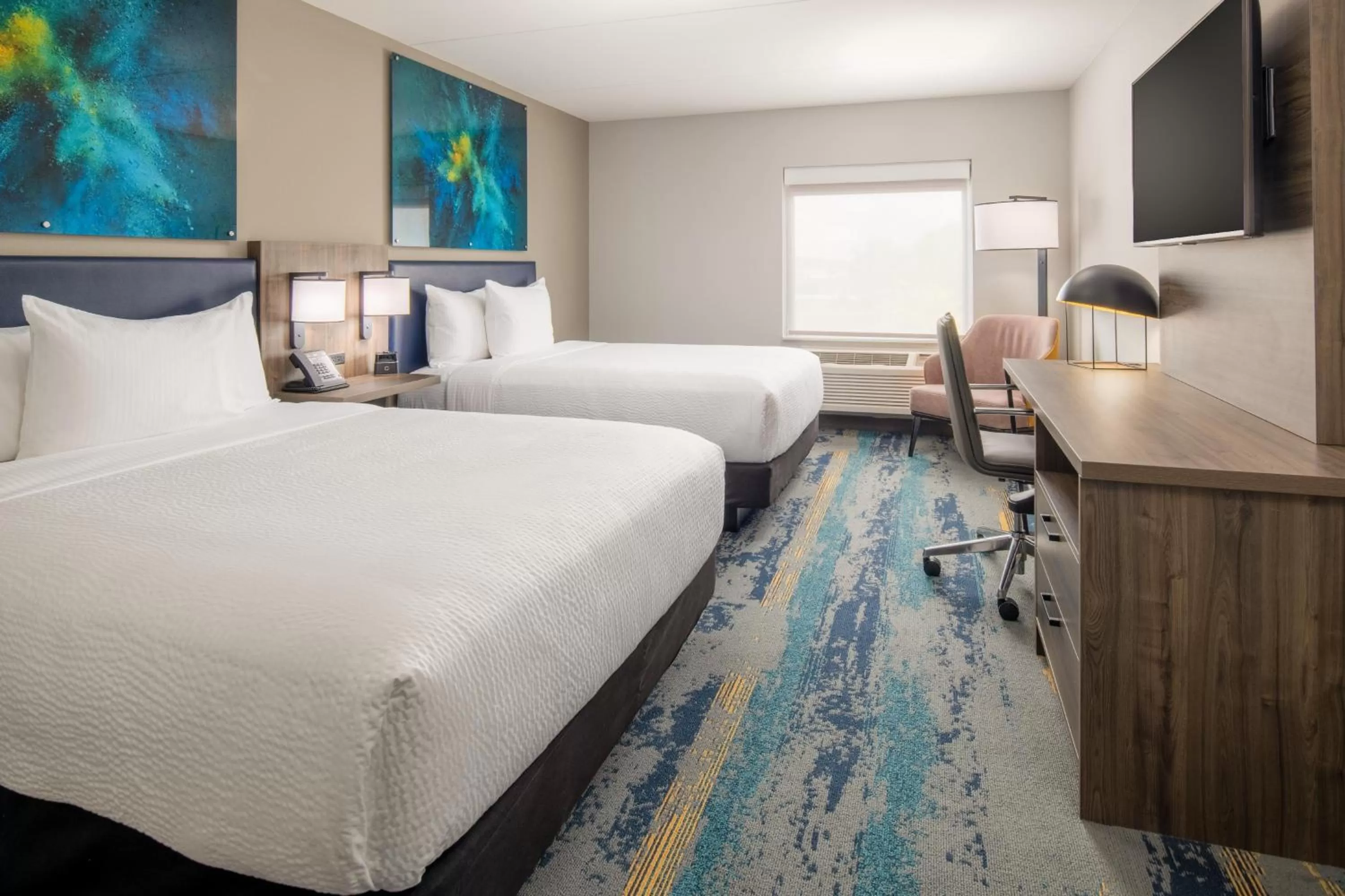 Bed in La Quinta Inn & Suites by Wyndham Spokane Downtown