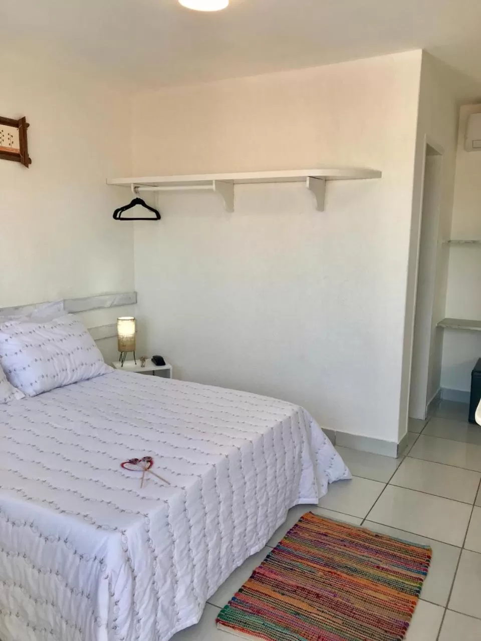 Bed in Pousada America do Sol