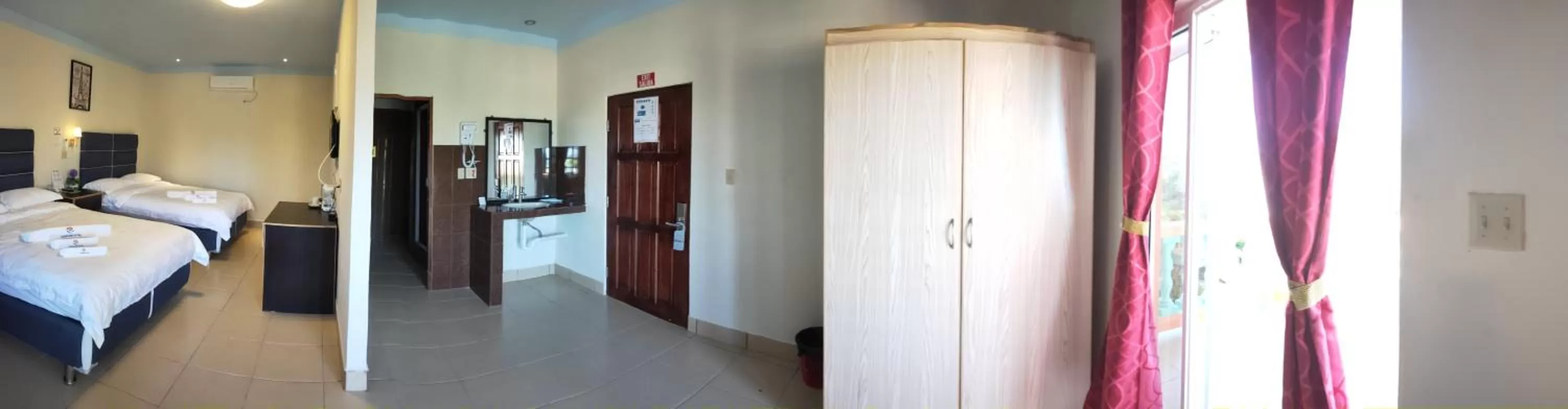 Bedroom in Sunshine View Hotel and Restaurant