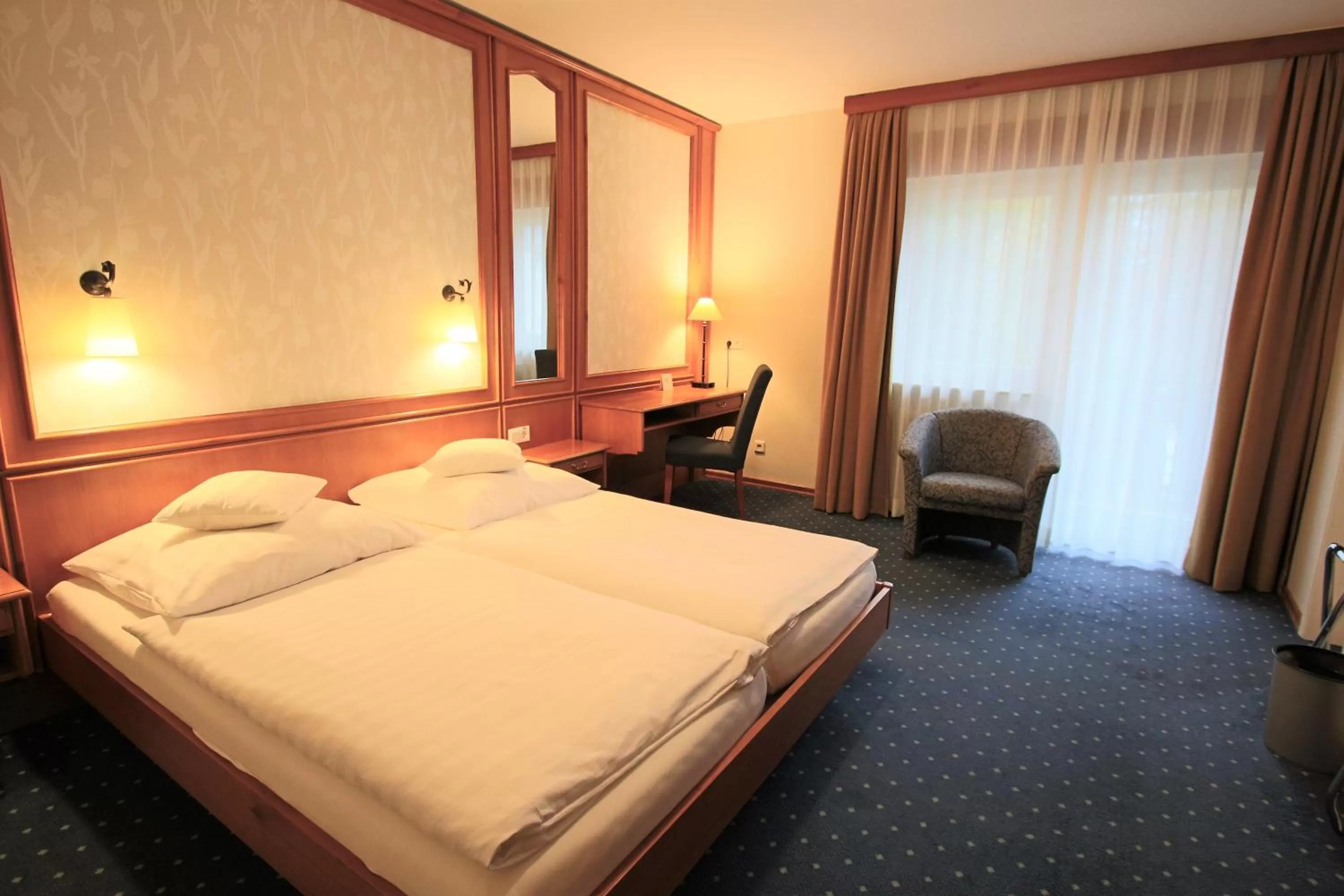 Photo of the whole room, Bed in Hardtwald Hotel