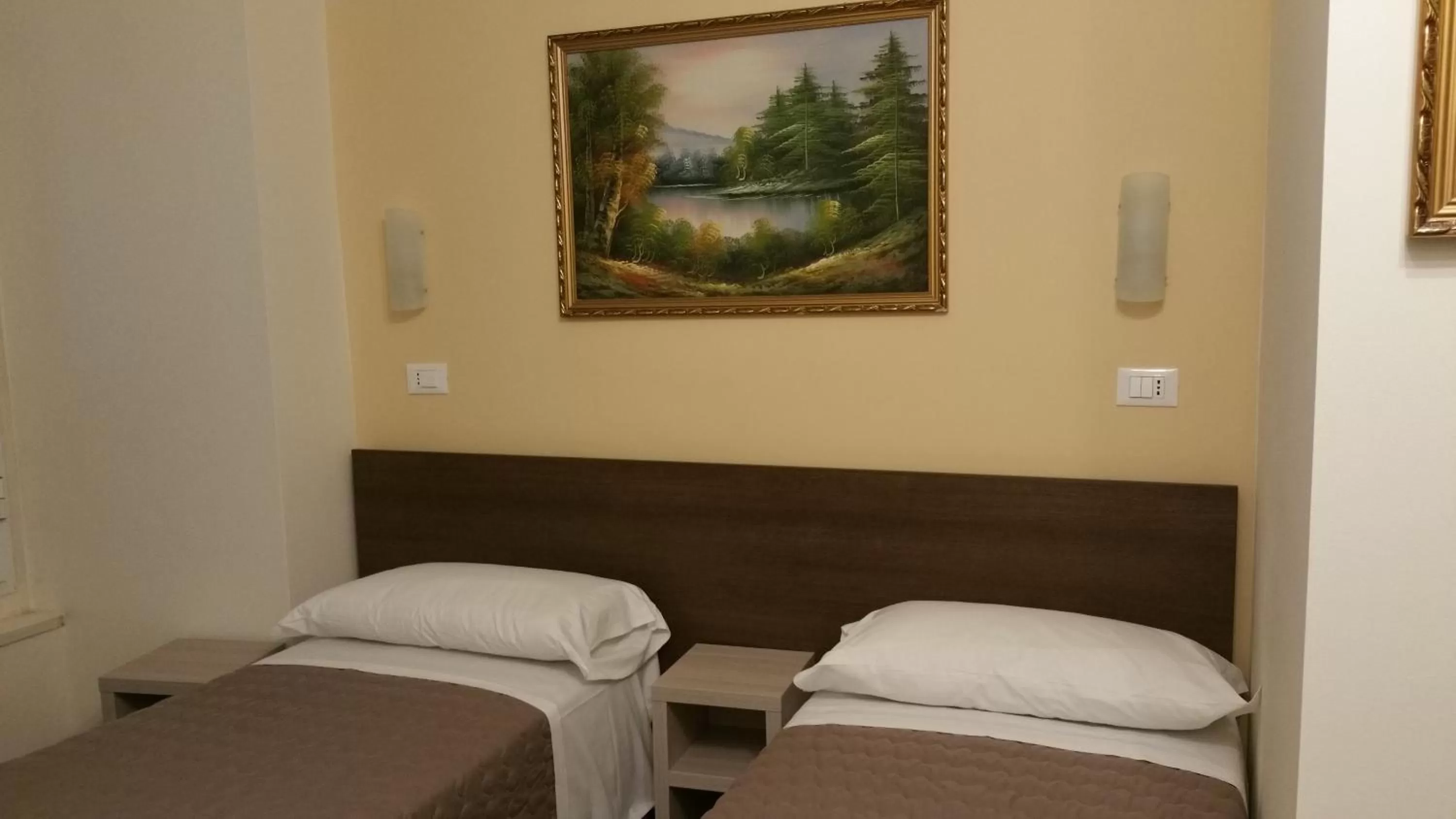 Bed in Hotel Tommaseo