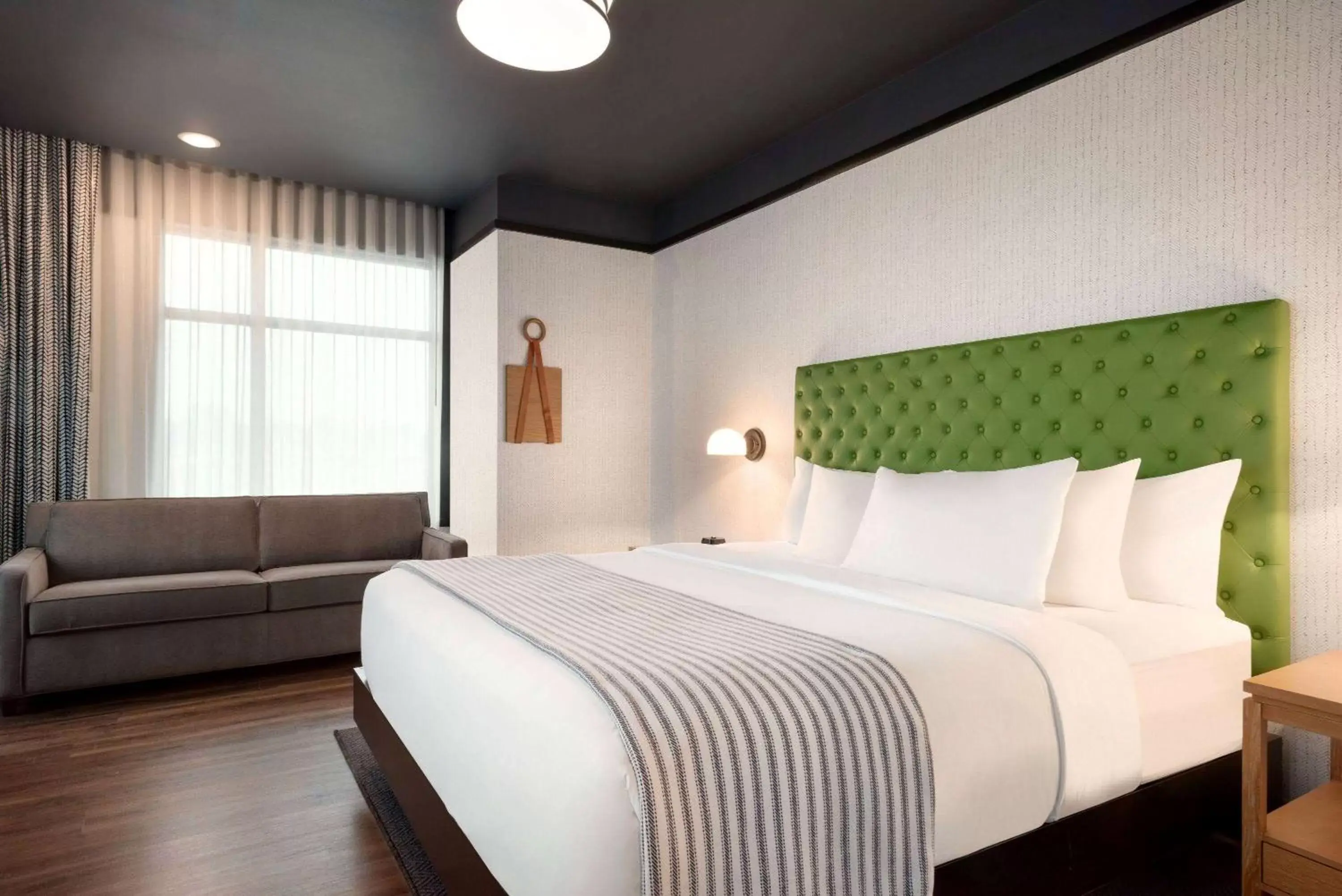 Corner King Room with Sofa Bed in Origin Lexington, a Wyndham Hotel Corner King Room with Sofa Bed in Origin Lexington, a Wyndham Hotel