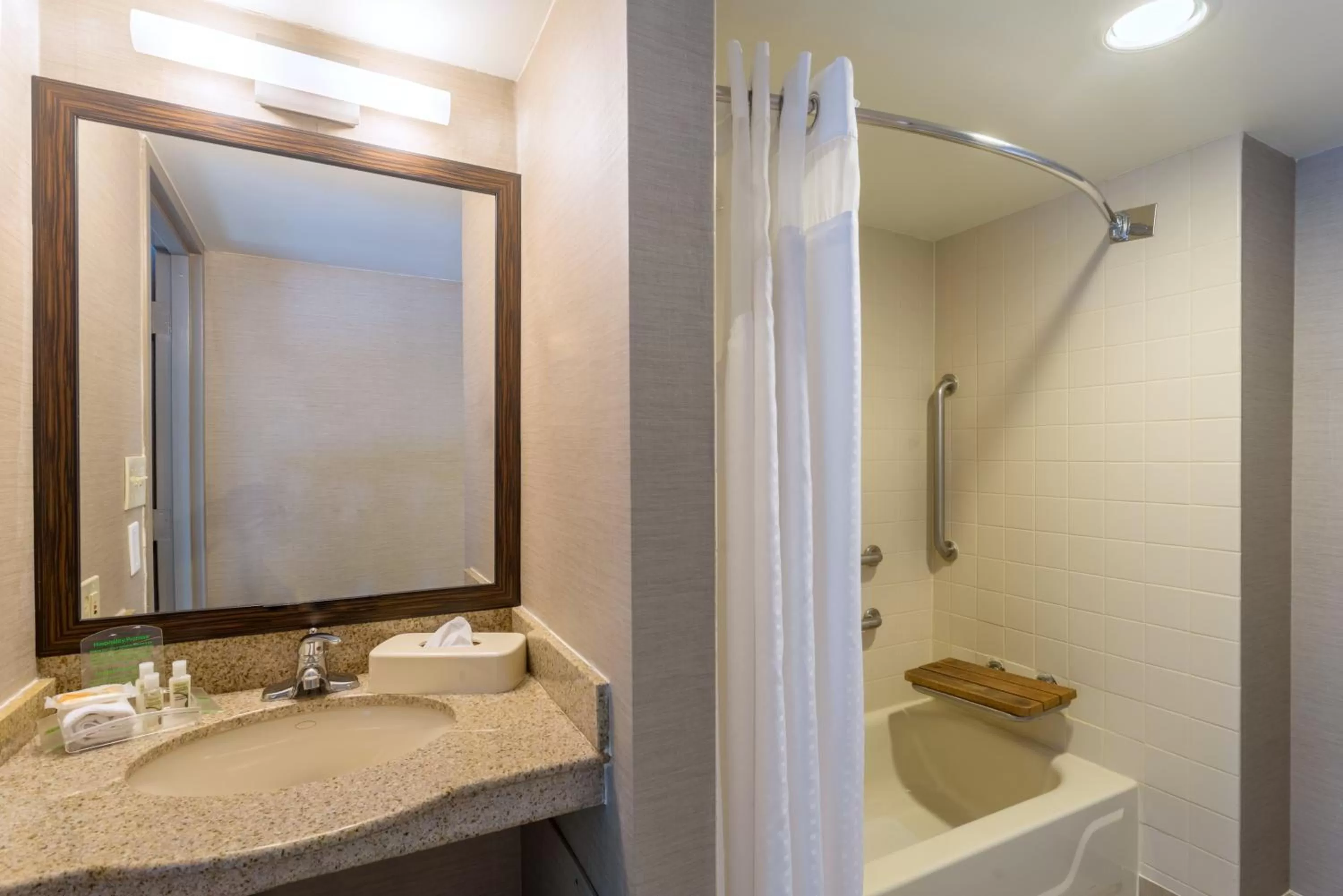 Bathroom in Holiday Inn Harrisburg I-81 Hershey Area by IHG