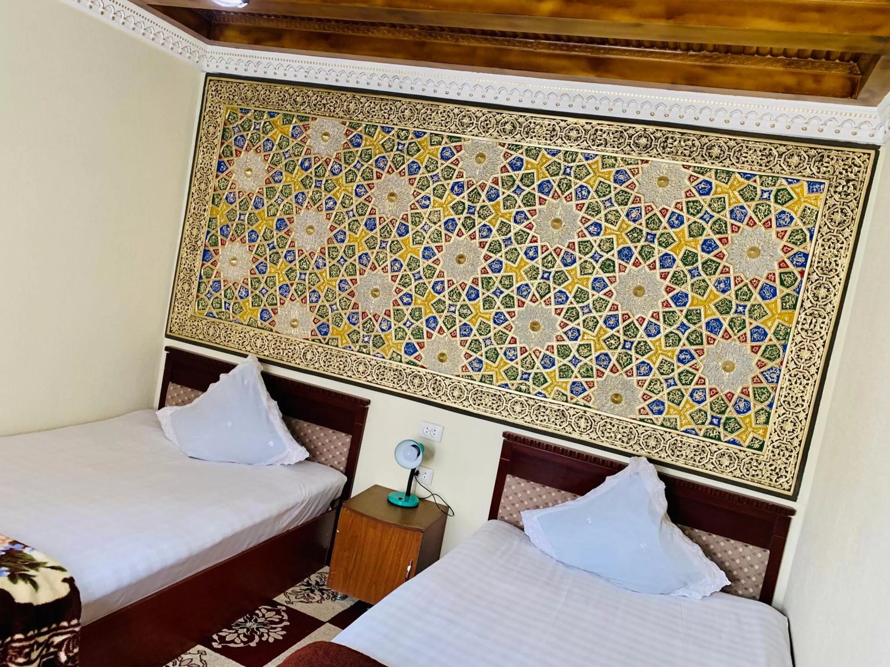 Bed in Sukhrob Barzu Hotel