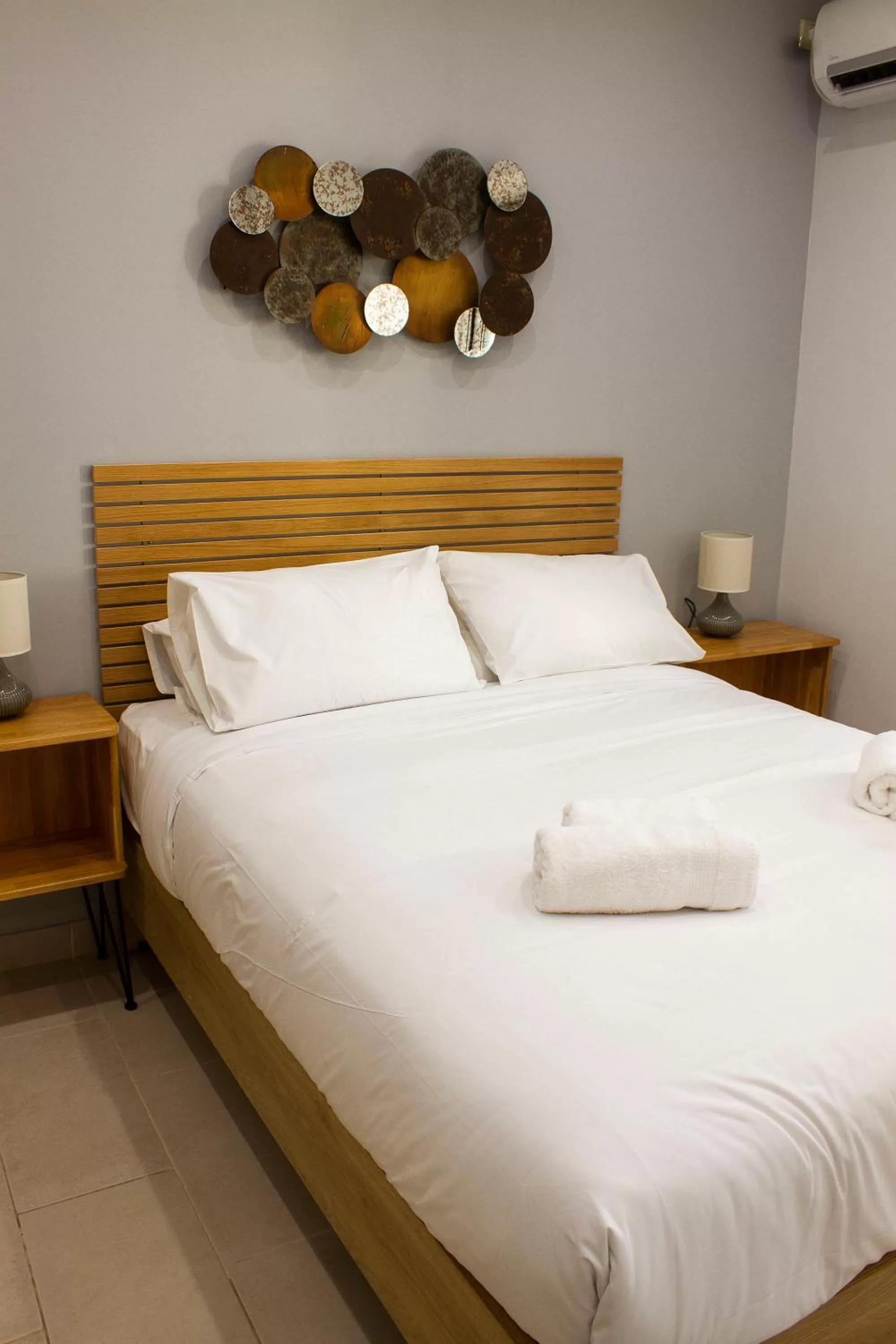 Bed in 12 Keys Athens Apartments