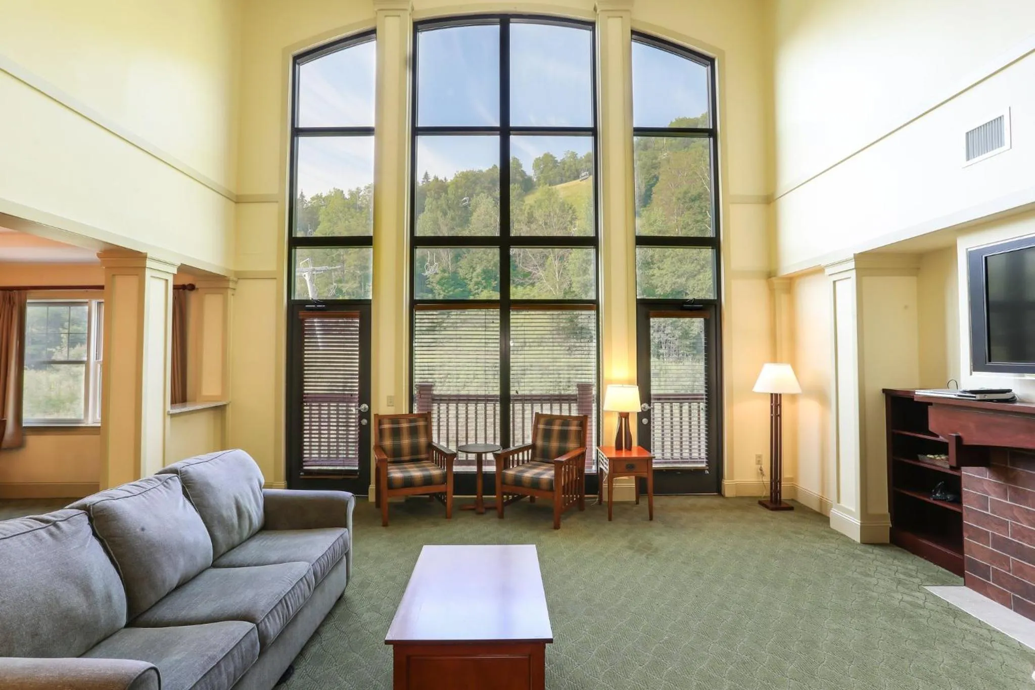 Living room in Kaatskill Mountain Club and Condos by Hunter Mountain