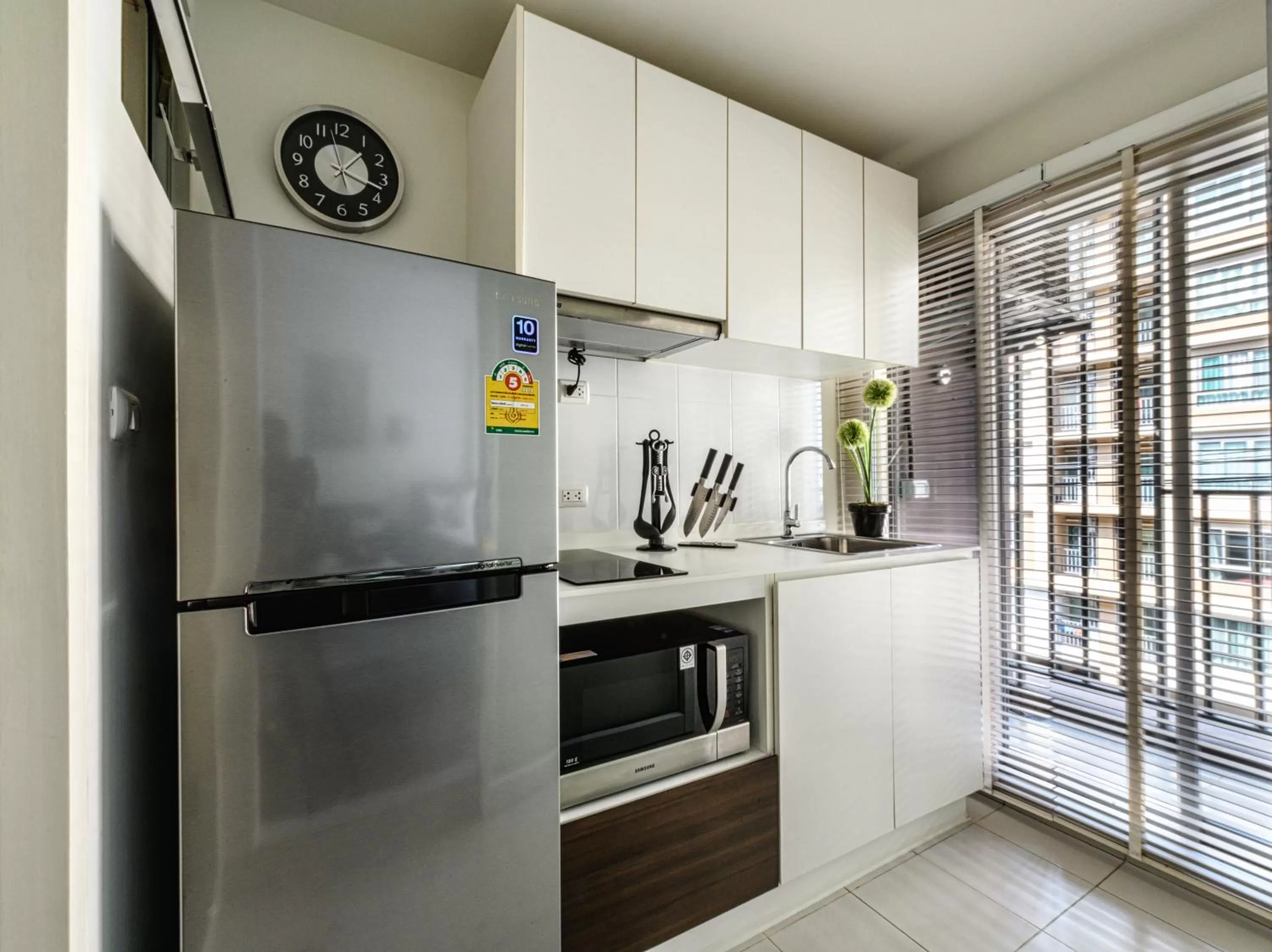 Kitchen or kitchenette in First Choice Suites SHA Plus Extra
