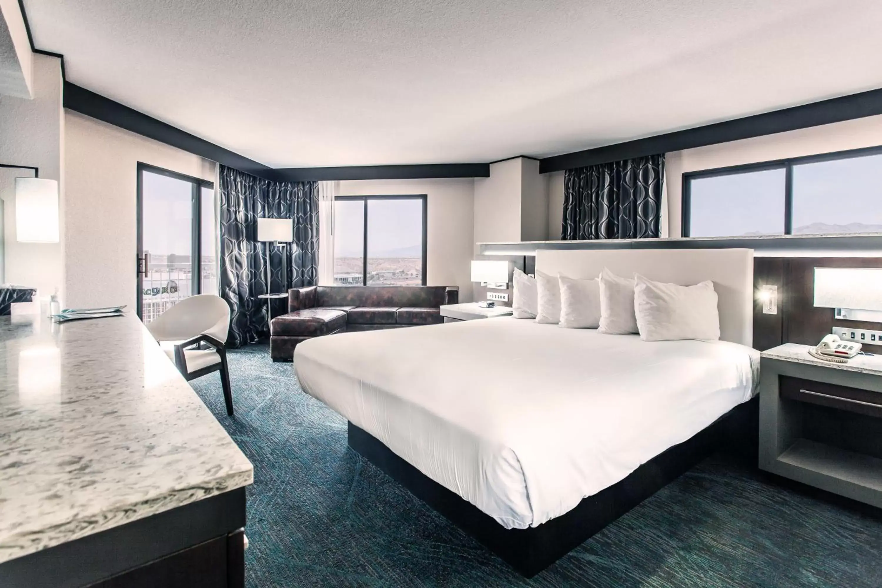Executive Room, 1 King Bed, Balcony, Sitting Area, Refrigerator (No Pets Allowed) in Don Laughlin's Riverside Resort & Casino Executive Room, 1 King Bed, Balcony, Sitting Area, Refrigerator (No Pets Allowed) in Don Laughlin's Riverside Resort & Casino