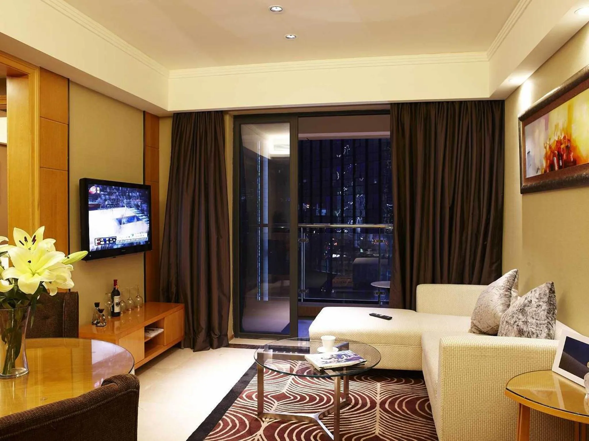 TV and multimedia in 广州丹顿行政公寓-Dan Executive Apartment Guangzhou Zhujiang New Town