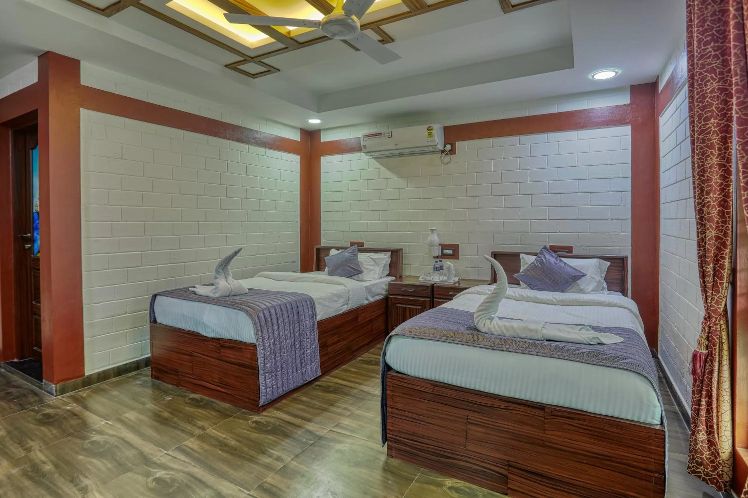 Bed in LEISURE VALLEY BEACH RESORT