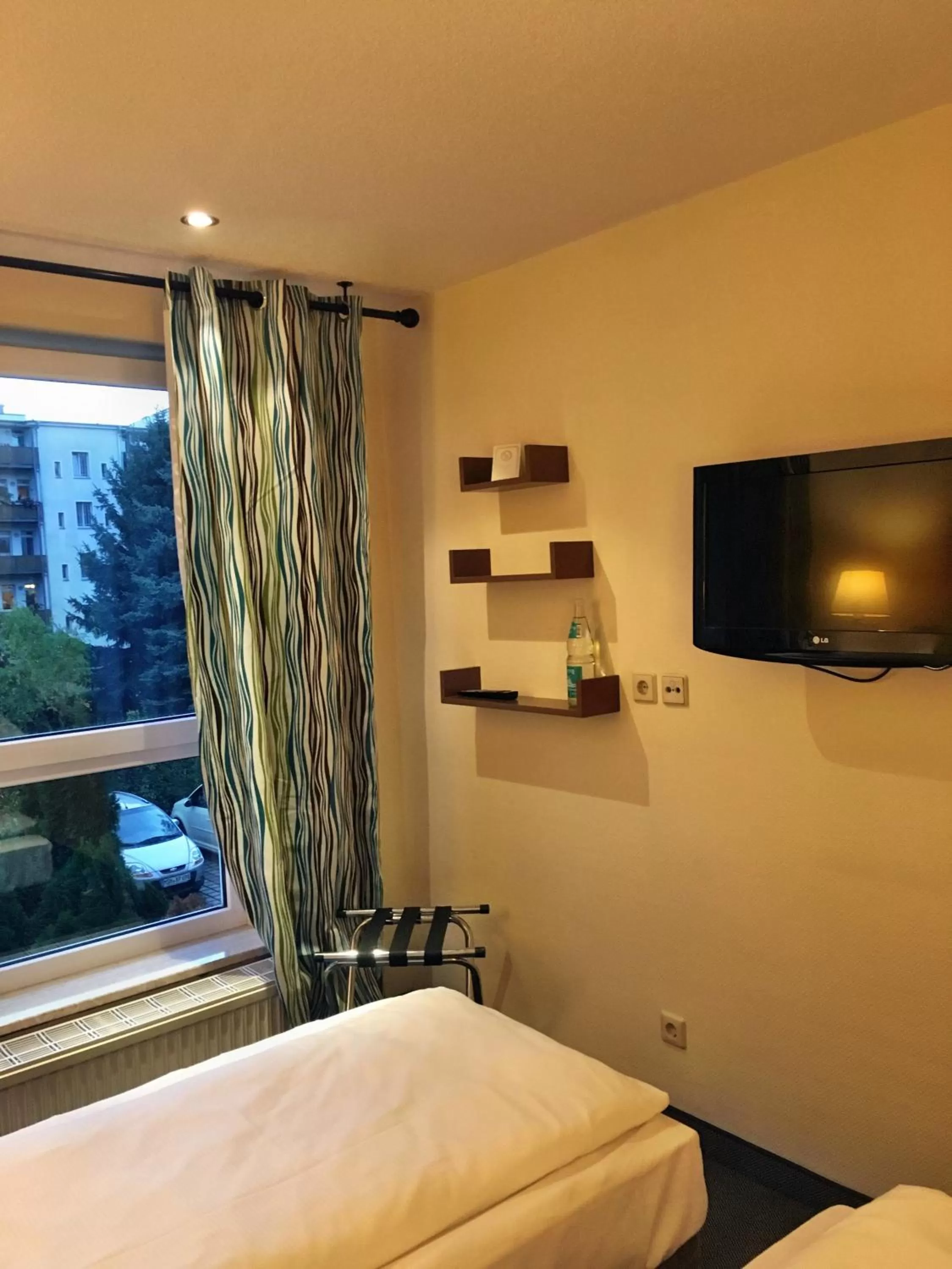 Photo of the whole room, Bed in Hotel Markgraf Leipzig