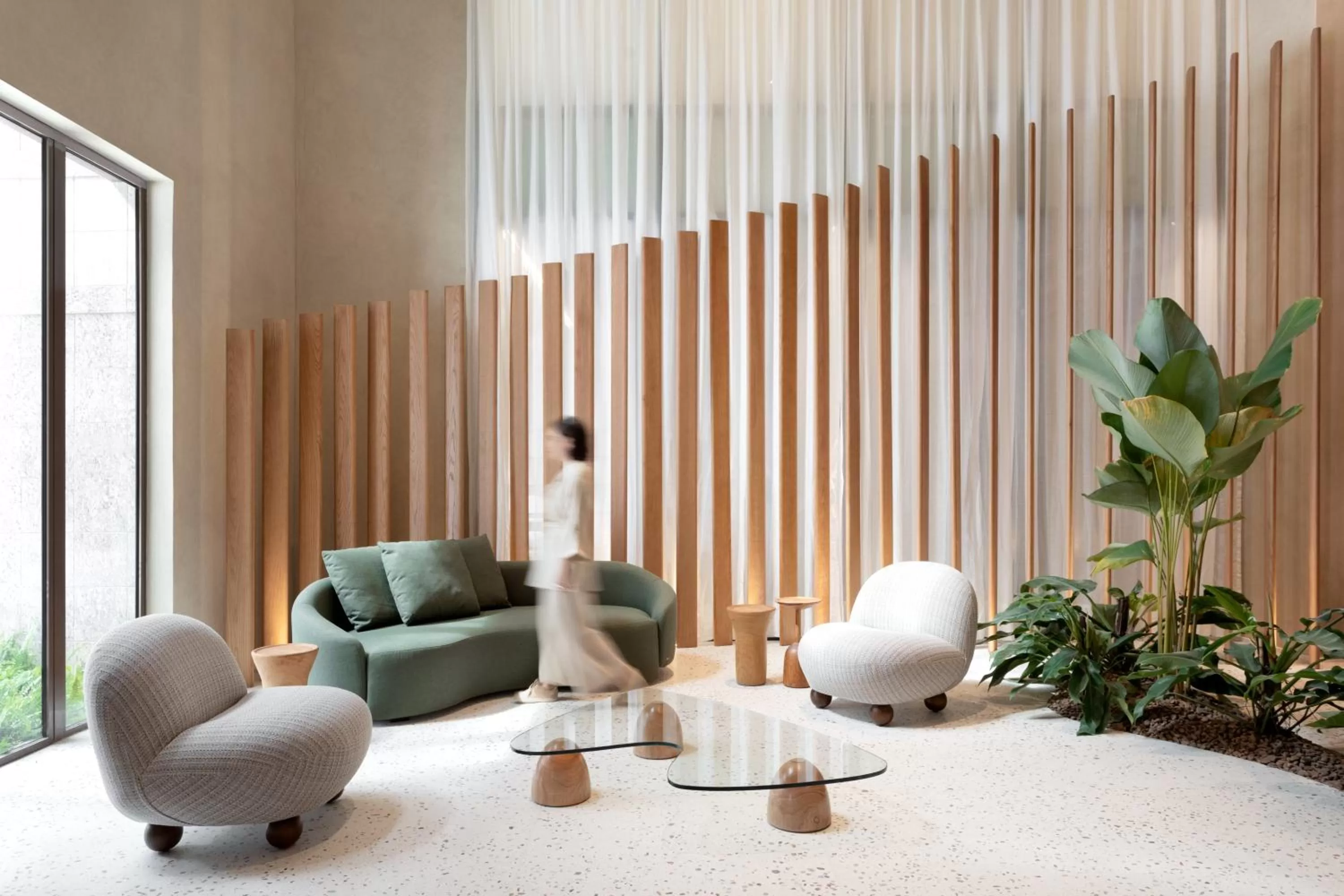 Seating area in QOYA Hotel Curitiba, Curio Collection by Hilton