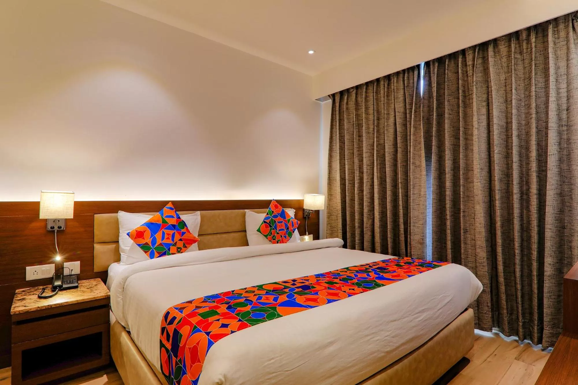 Bed in FabHotel Aurelia Grand