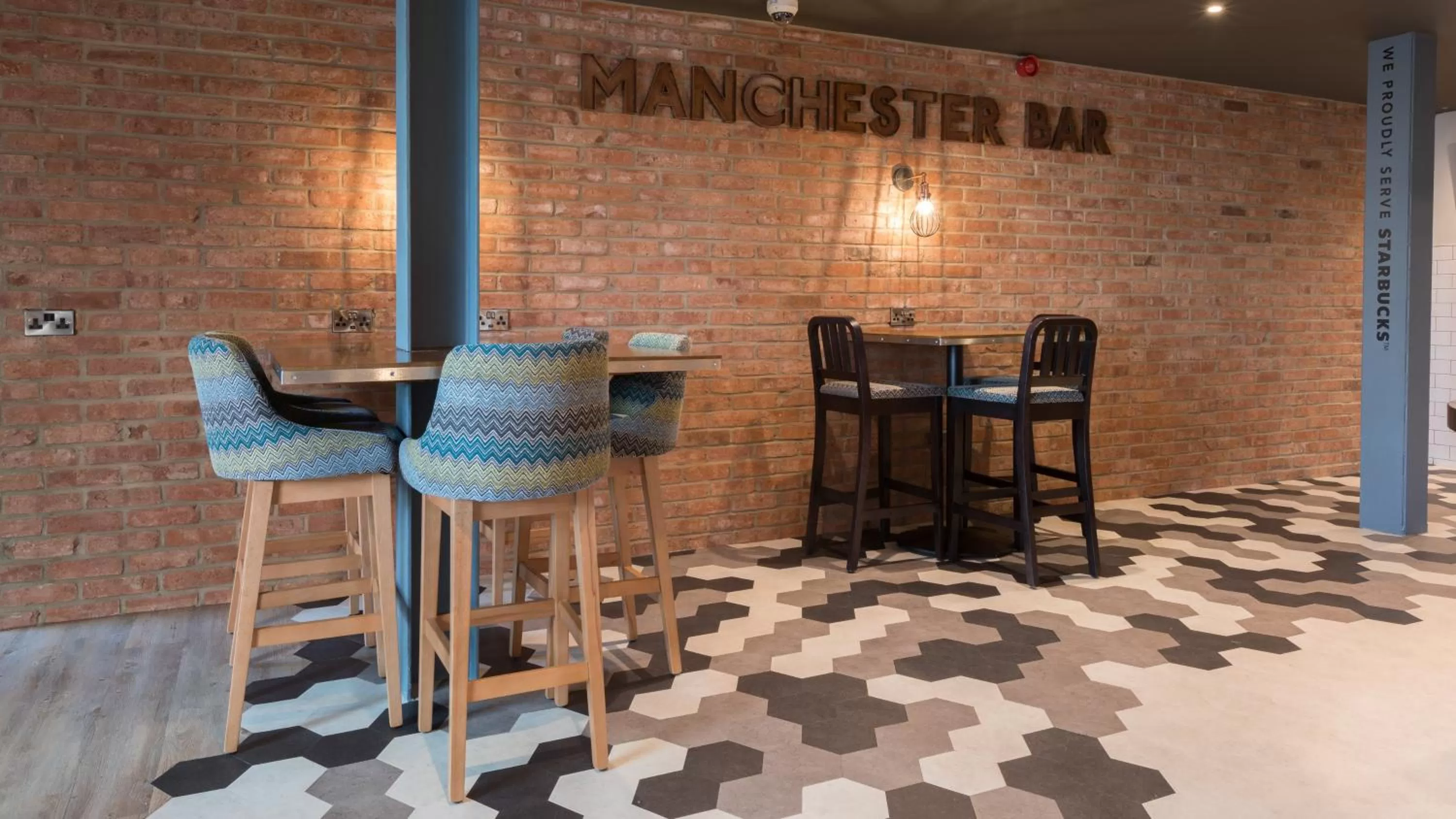 Lounge or bar in Holiday Inn Manchester - Central Park, an IHG Hotel