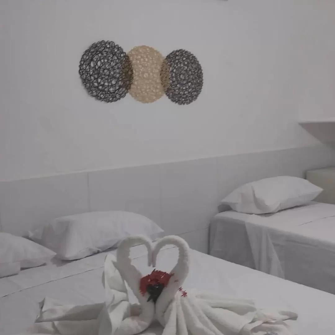 Bed in Ecomar Pousada