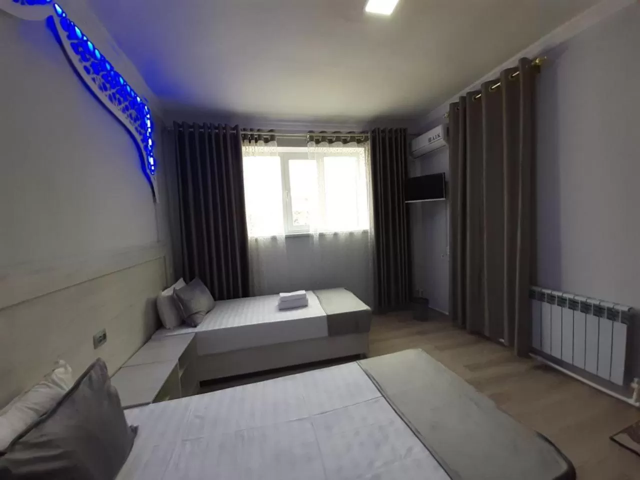 Bed in Risqiro'z Ancient Boutique Hotel