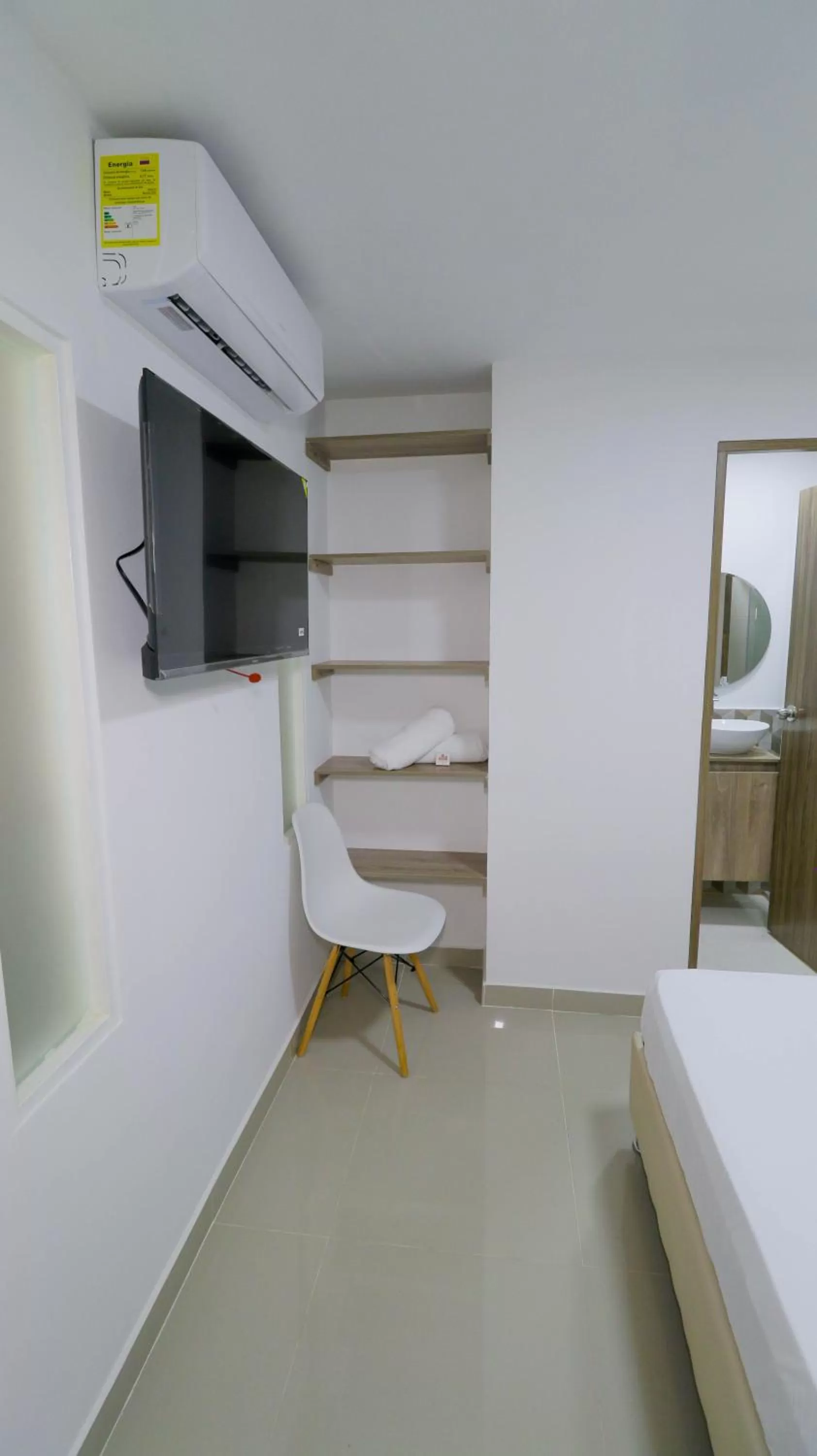 wardrobe, TV/Entertainment Center in Aw Hotel Pasarela Real