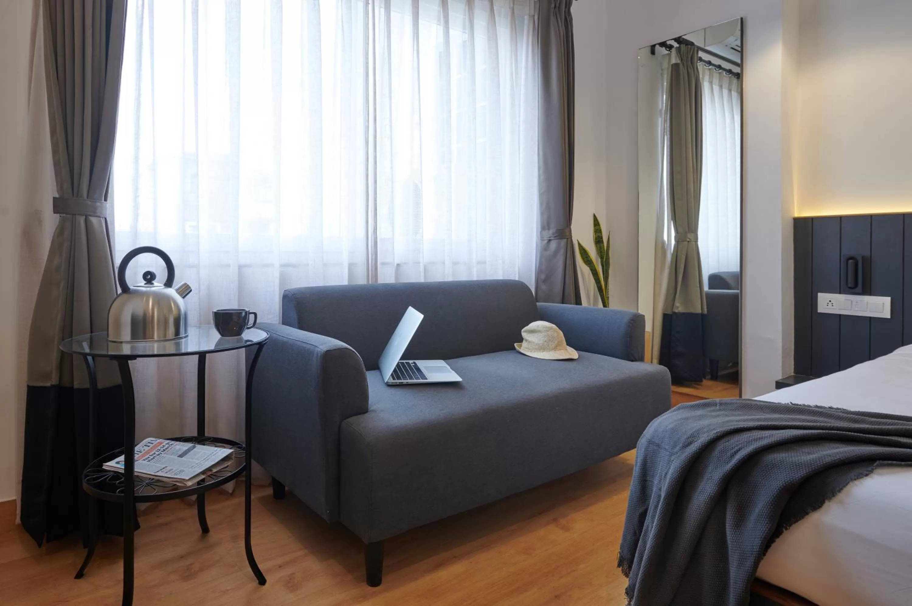 Seating area, Bed in Poshtel VNS