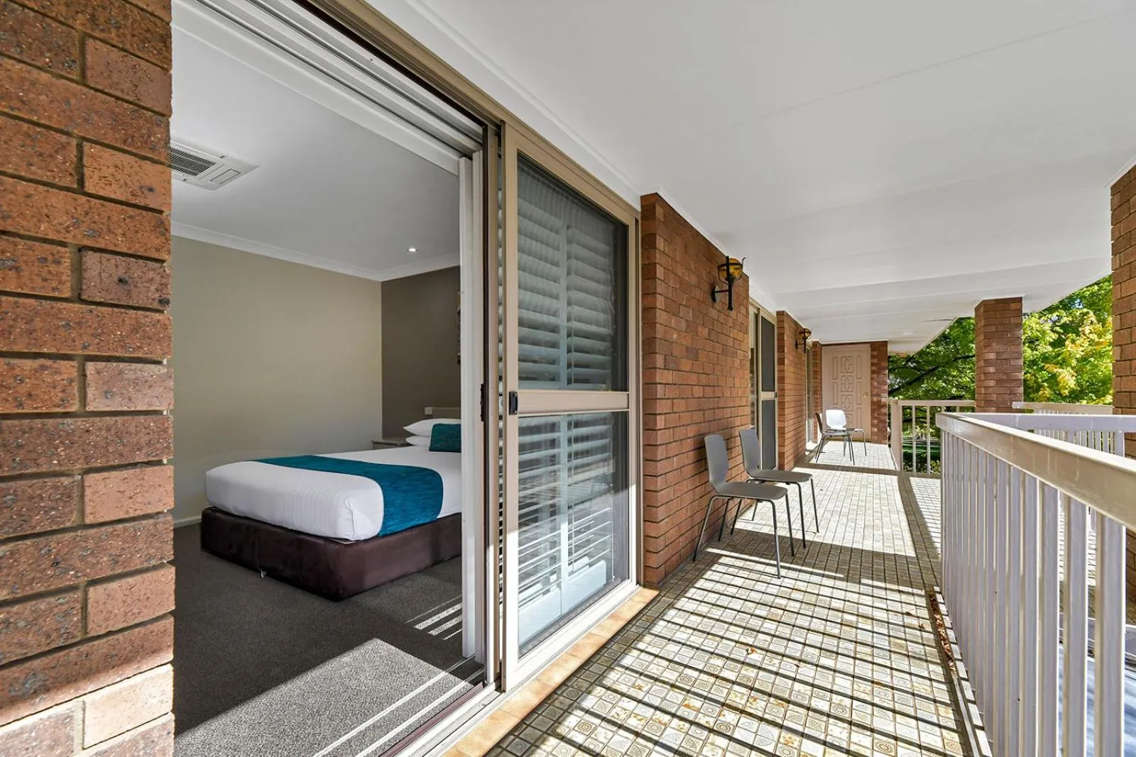 Bed in Central Caleula Motor Lodge