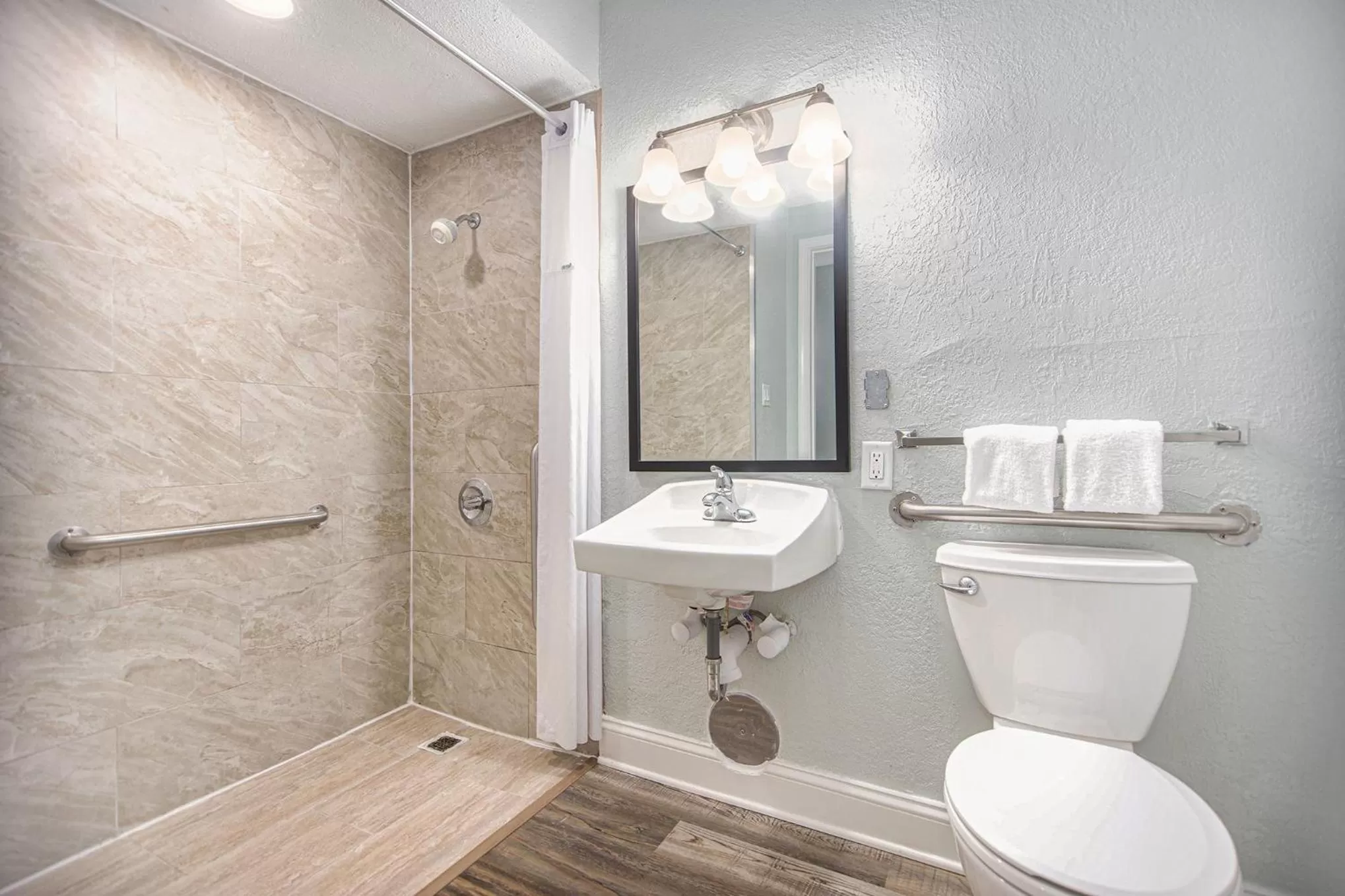 Bathroom in Baymont by Wyndham Grand Haven