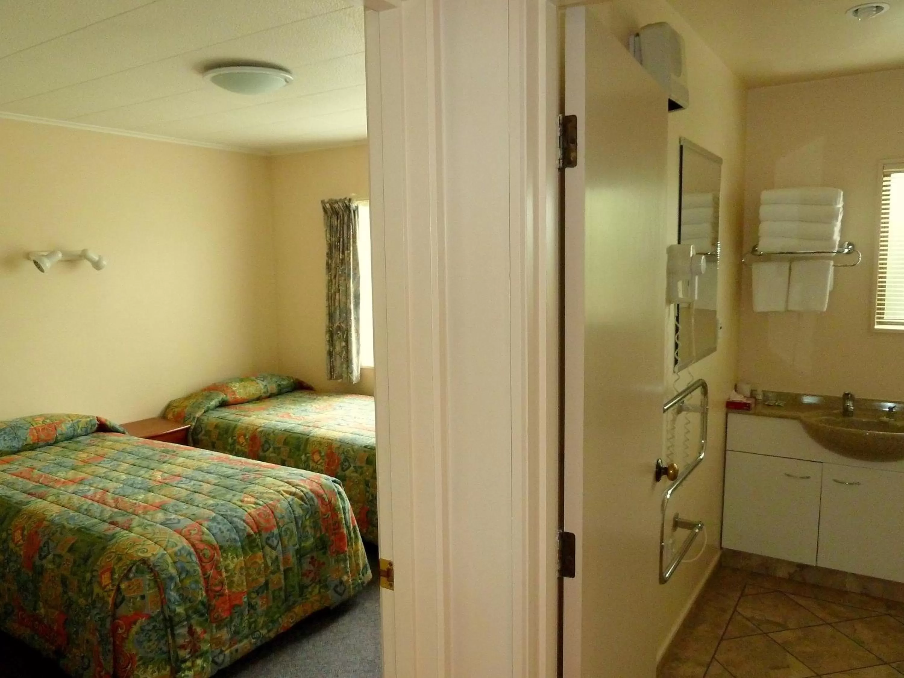 Decorative detail, Bed in Tudor Lodge Motel