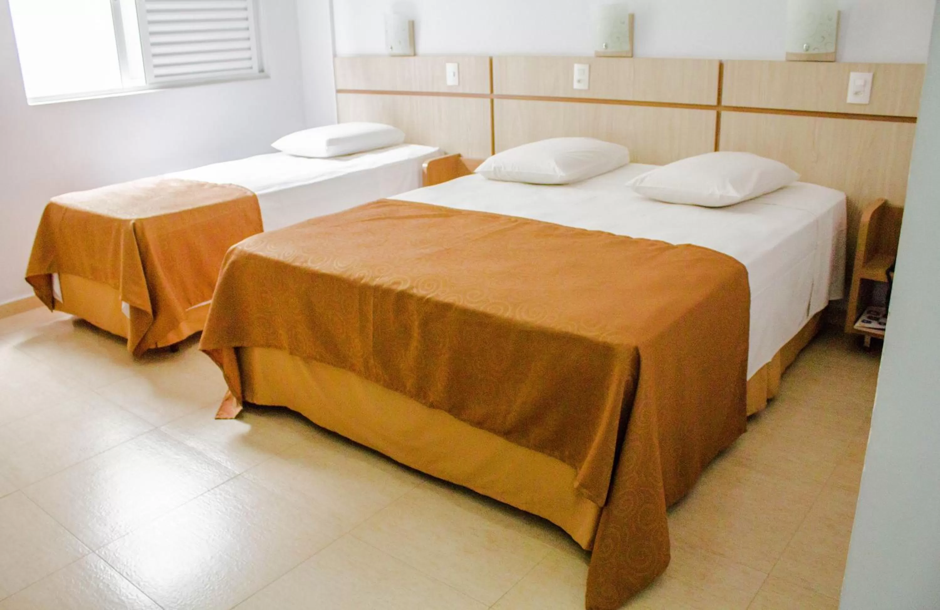 Bed in Hotel Baviera Iguassu