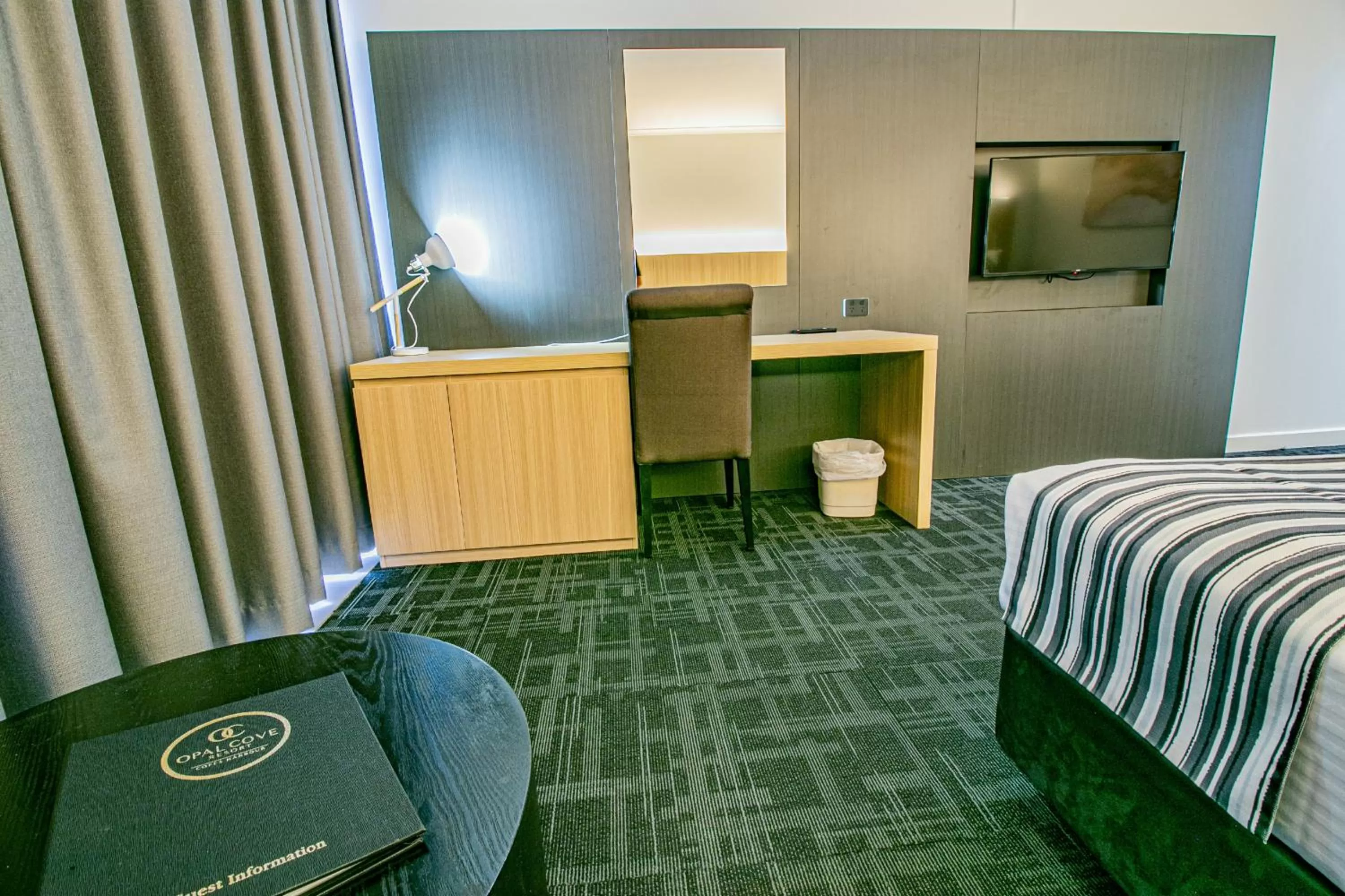 Bed in Absolute Beachfront Opal Cove Resort