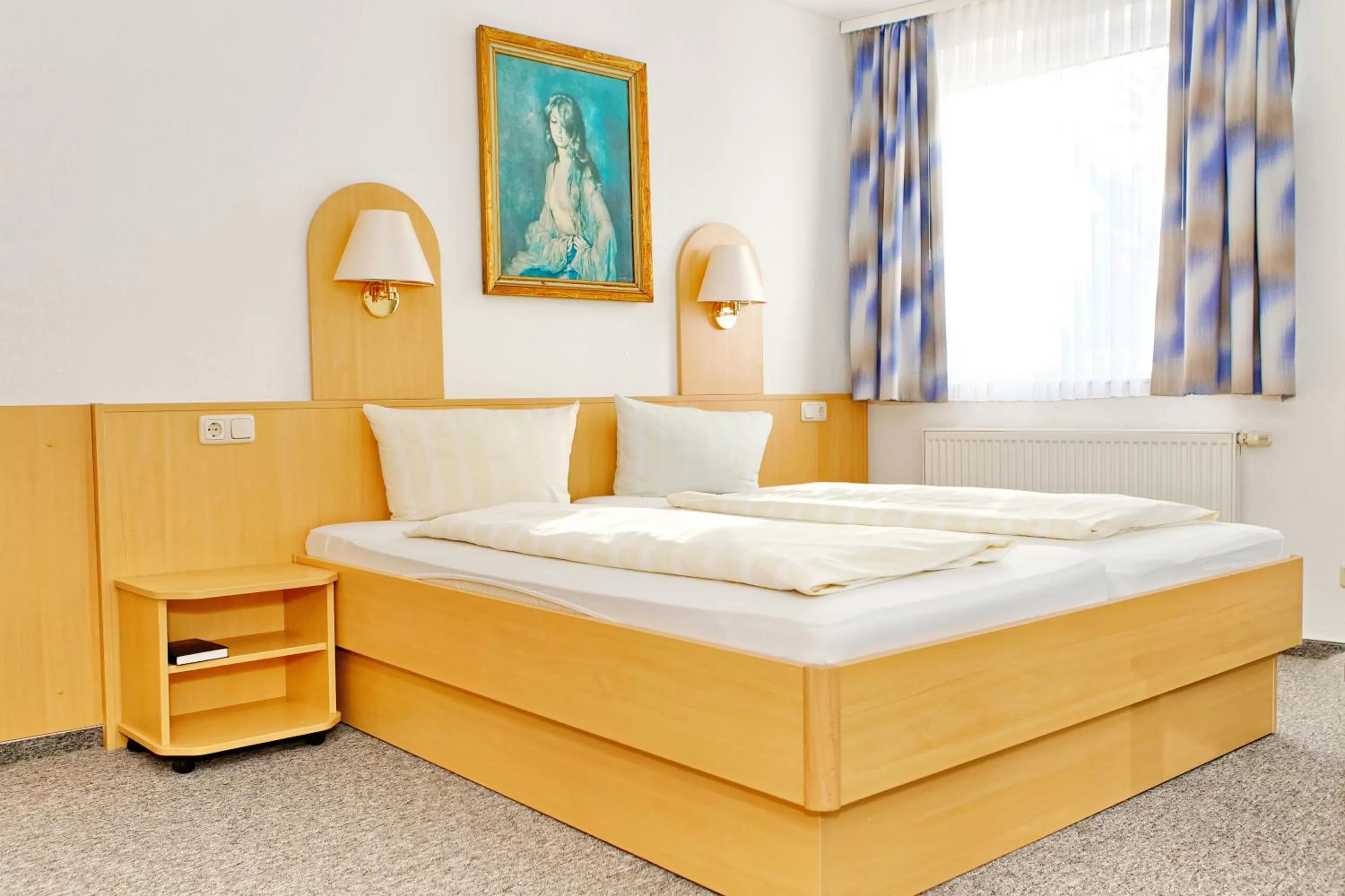 Bed in Zeitwohnen Wolfsburg, ehemals Hotel am Klieversberg ein Unternehmen der Micha'S Hotelbetriebe